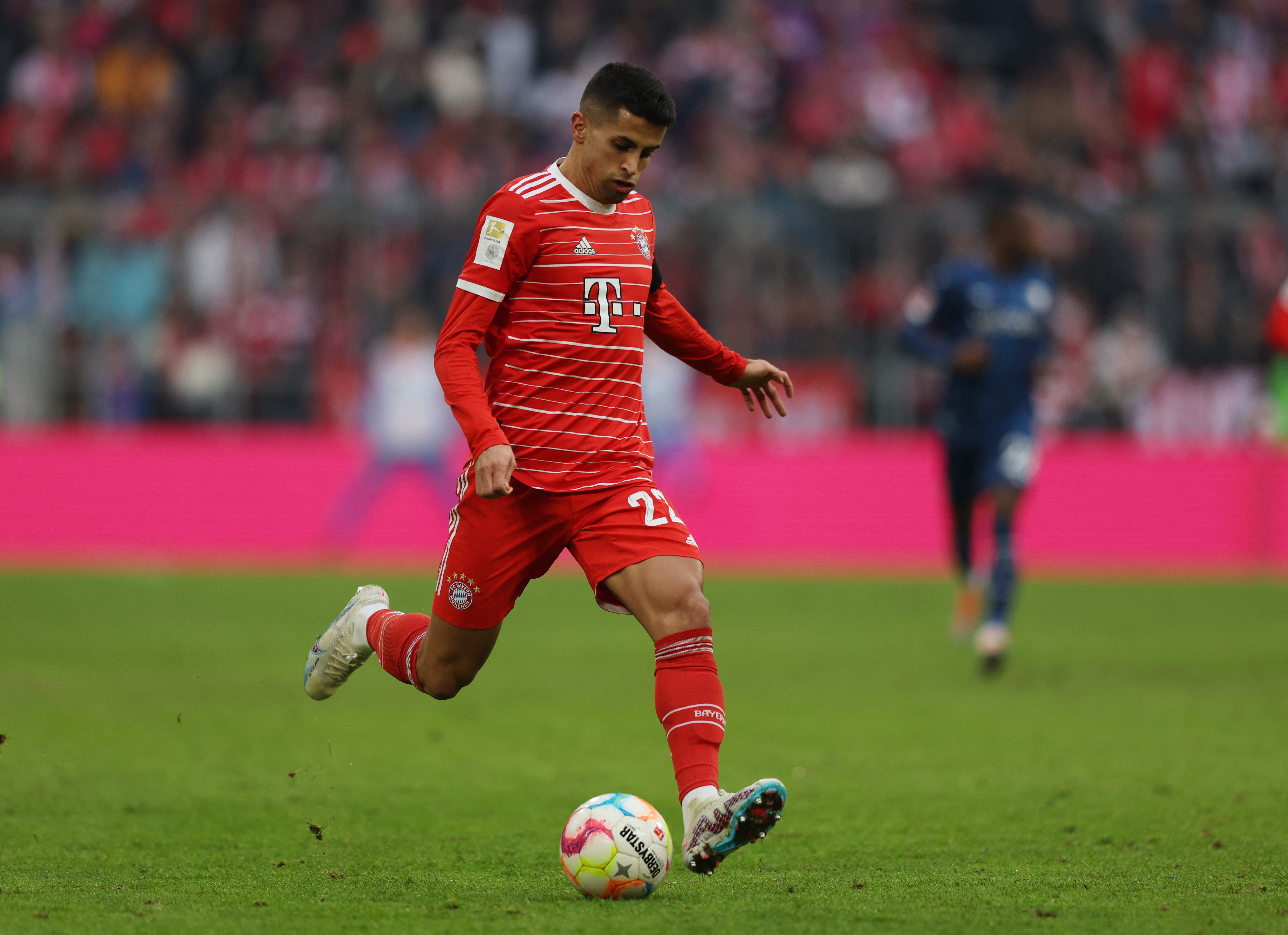 Manchester City's Joao Cancelo heads the ball during the Champions