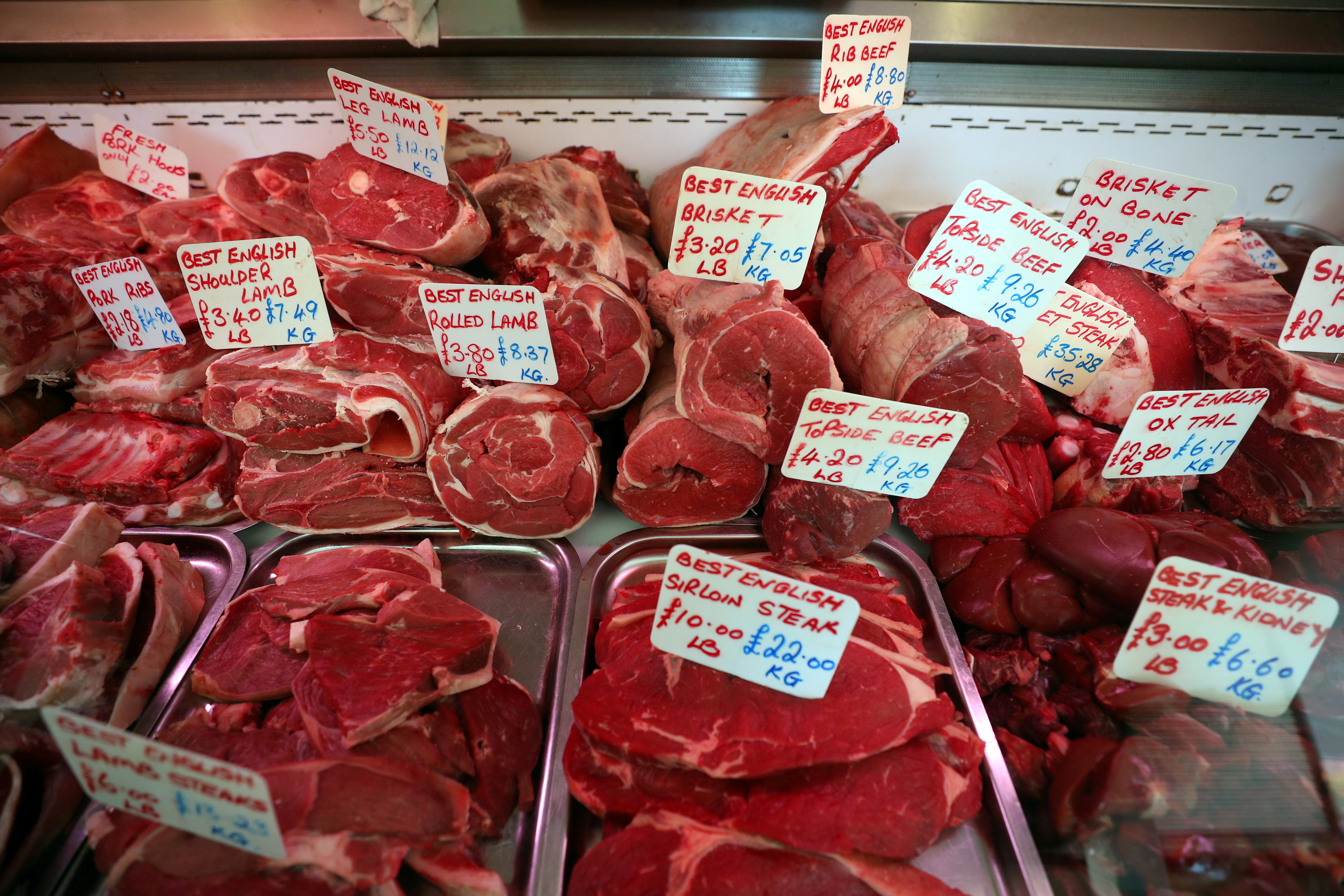 Fresh meat is displayed for sale in a butchers meat counter in Great Yarmouth