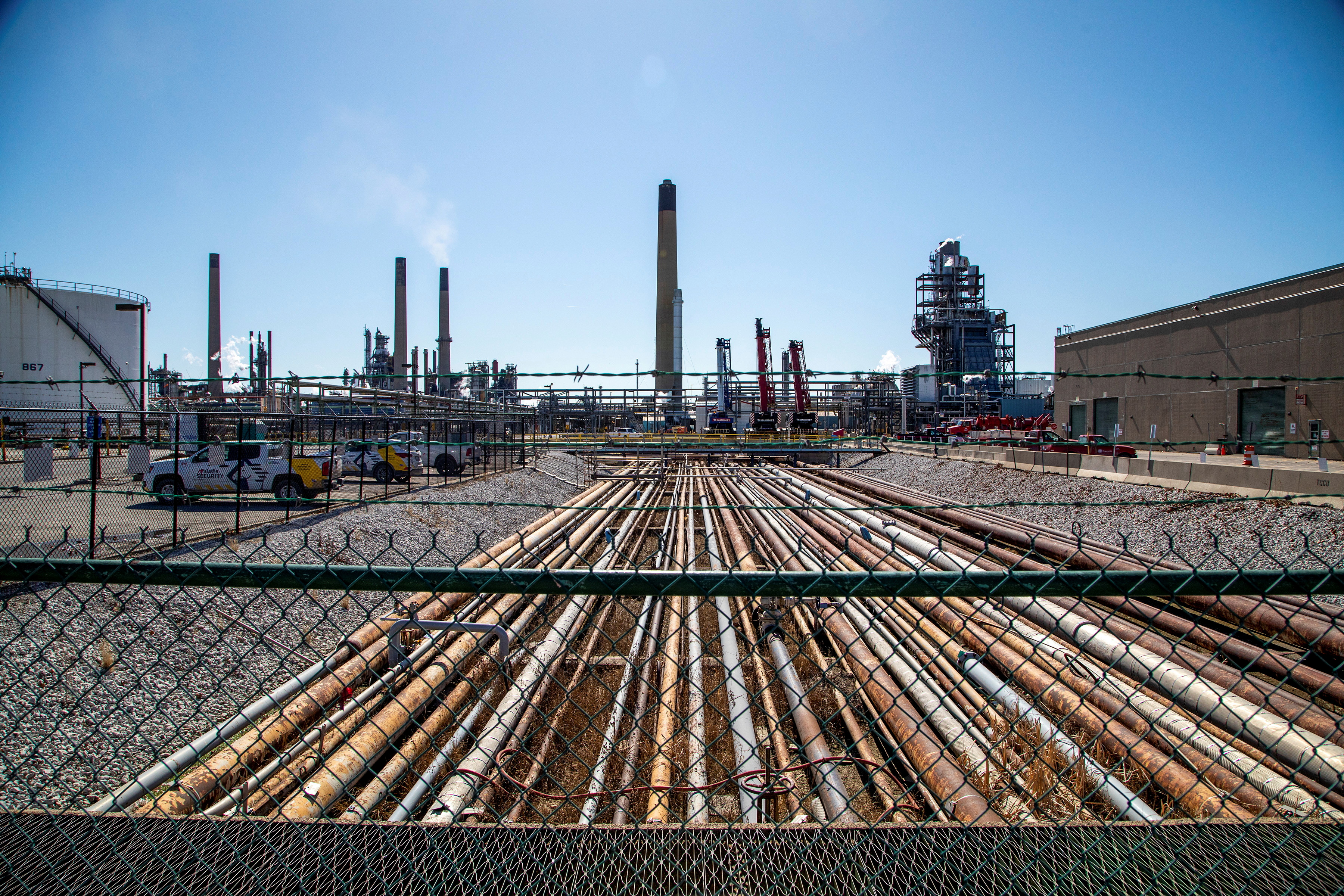 General view of the Imperial Oil refinery, located near Enbridge's Line 5 pipeline, which Michigan Governor Gretchen Whitmer ordered shut down in May 2021, in Sarnia, Ontario, Canada March 20, 2021.  Picture taken through a fence. REUTERS/Carlos Osorio/File Photo