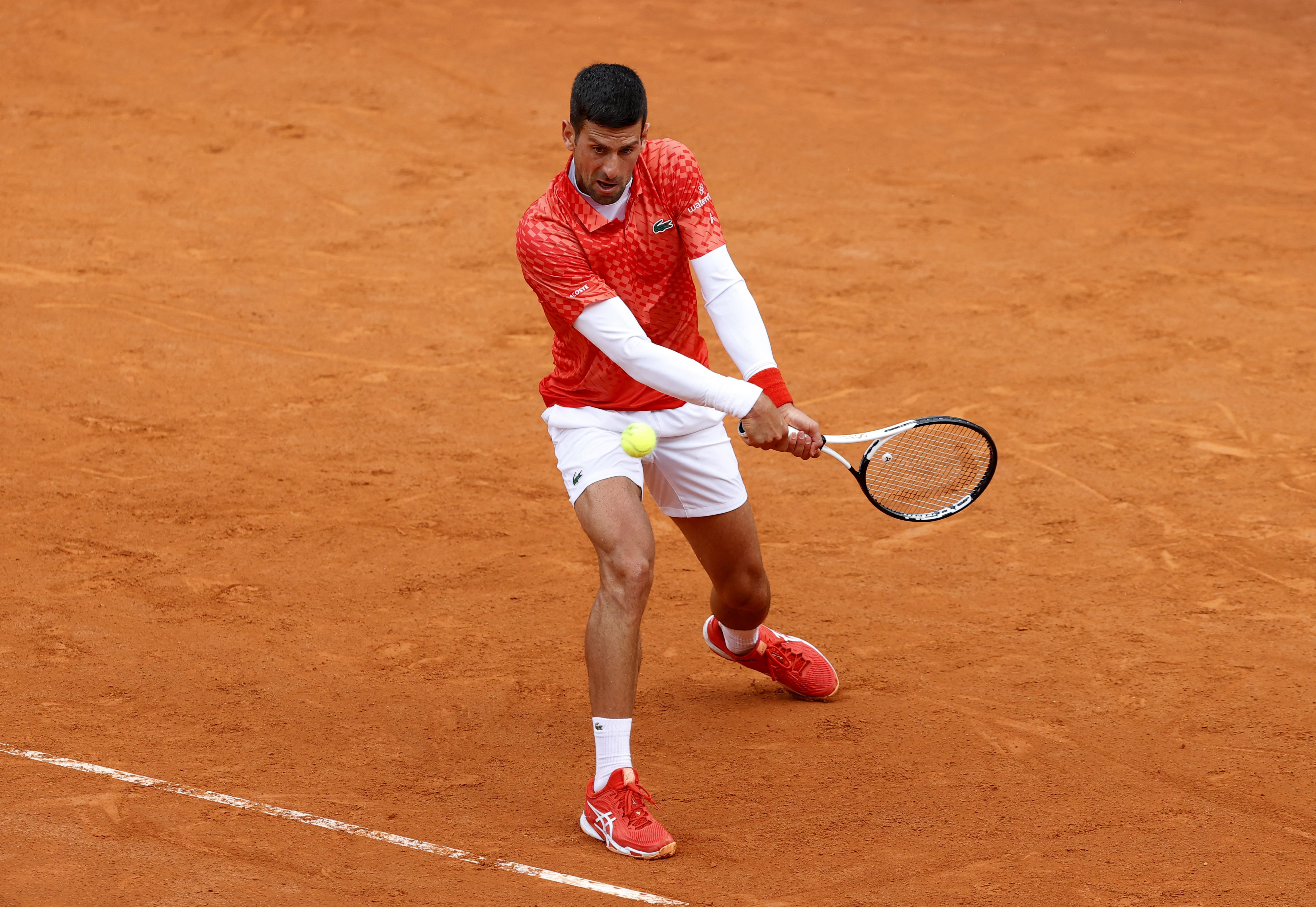 Serbia's Novak Djokovic shouts during the quarter final match against  Denmark's Holger Rune at the Italian Open tennis tournament, in Rome,  Wednesday, May 17, 2023. (AP Photo/Gregorio Borgia Stock Photo - Alamy