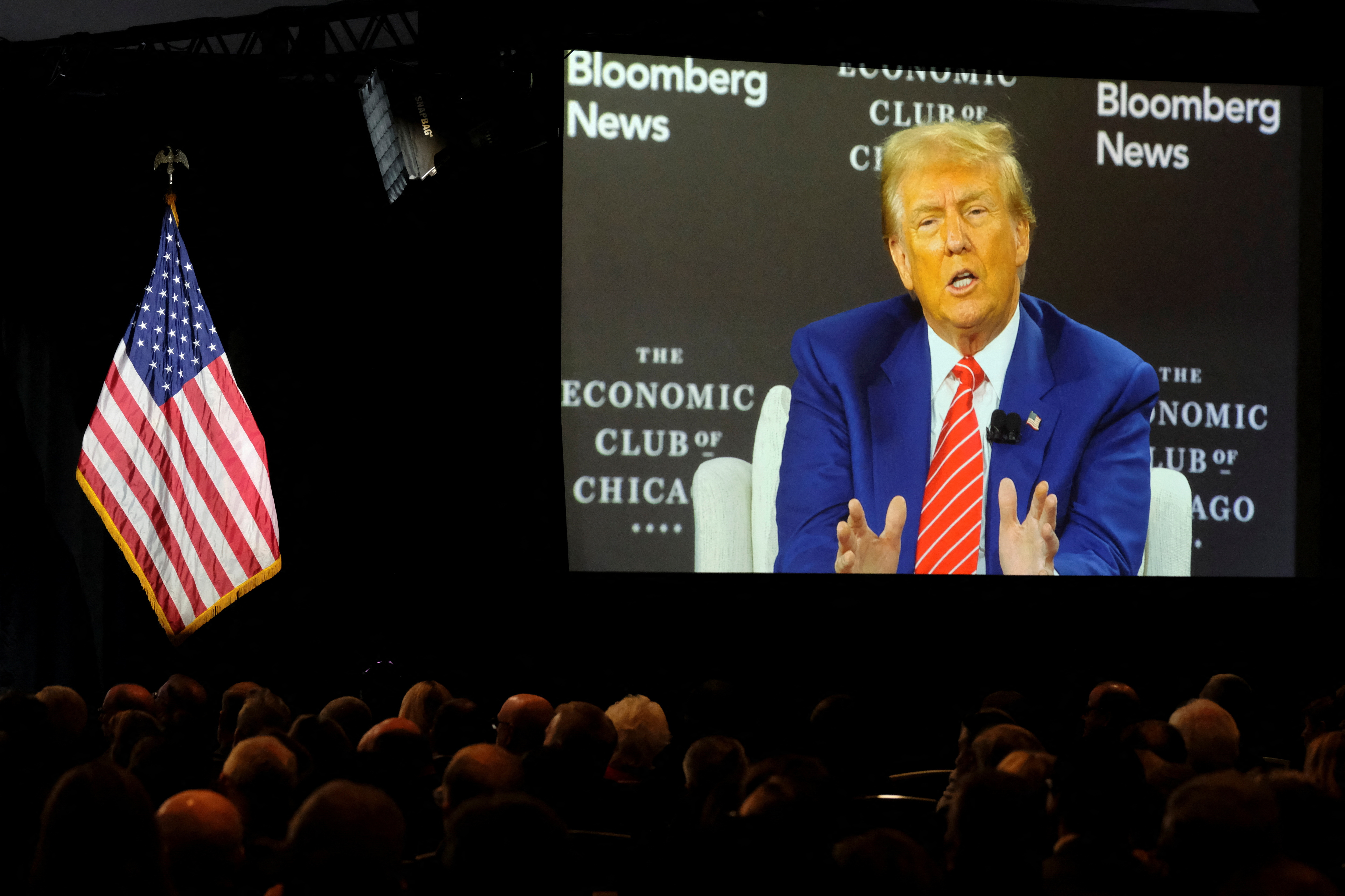 Under fire, Trump contends economic policies won't boost federal debt | Reuters