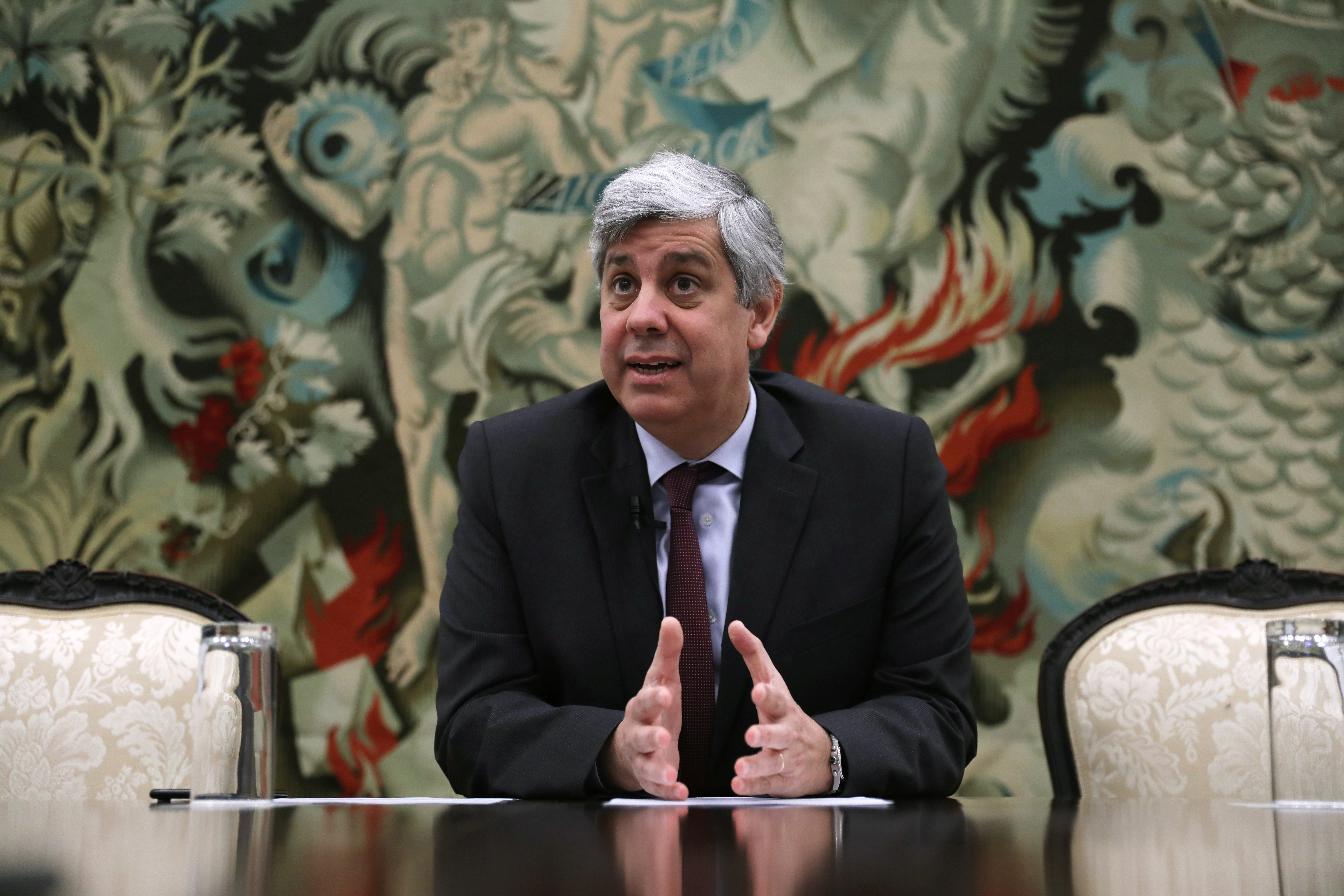 Portugal's Finance Minister and Eurogroup President Mario Centeno gestures during an interview with Reuters in Lisbon