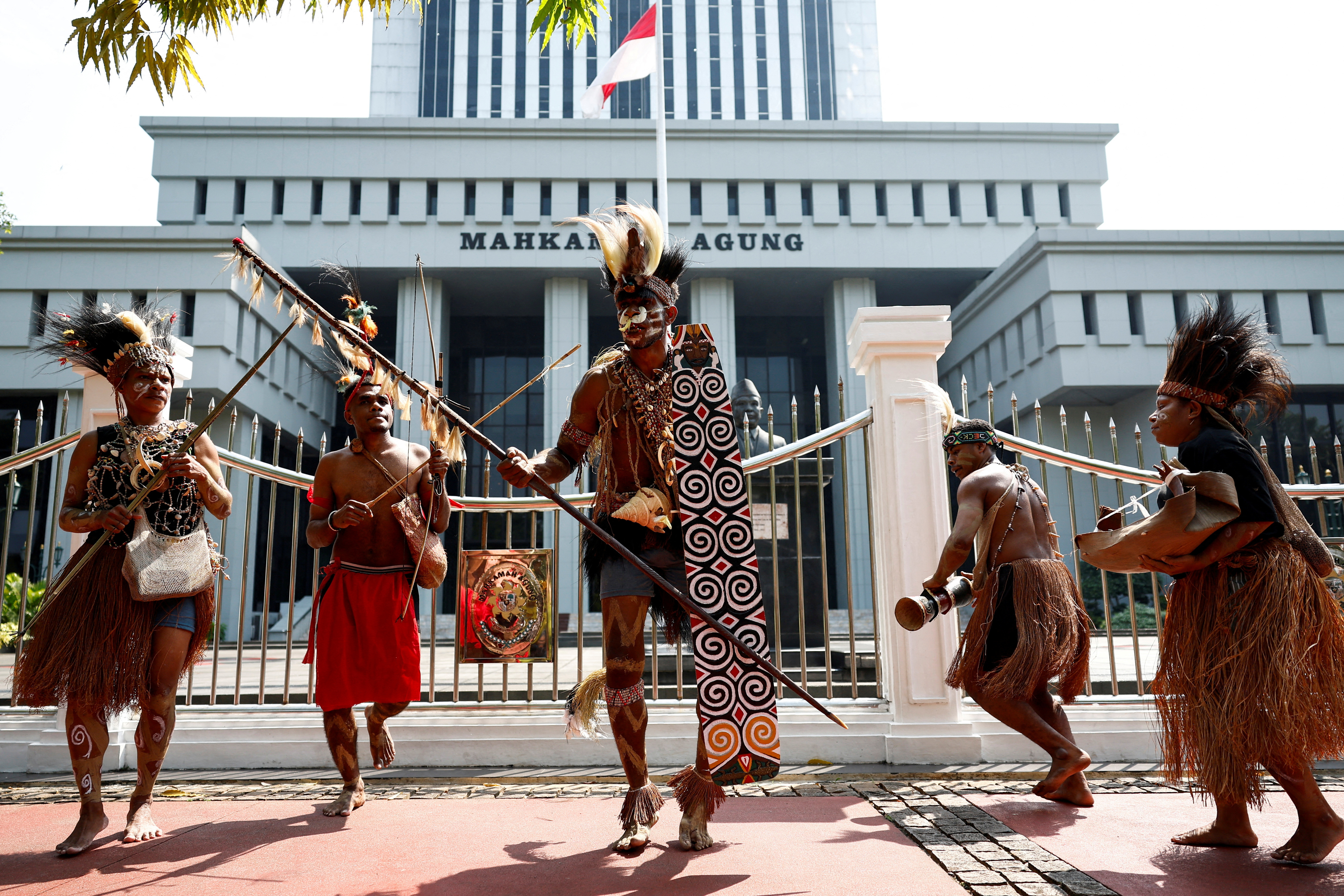 Protest against deforestation in indigenous Papuans' land, outside the country's Supreme Court in Jakarta