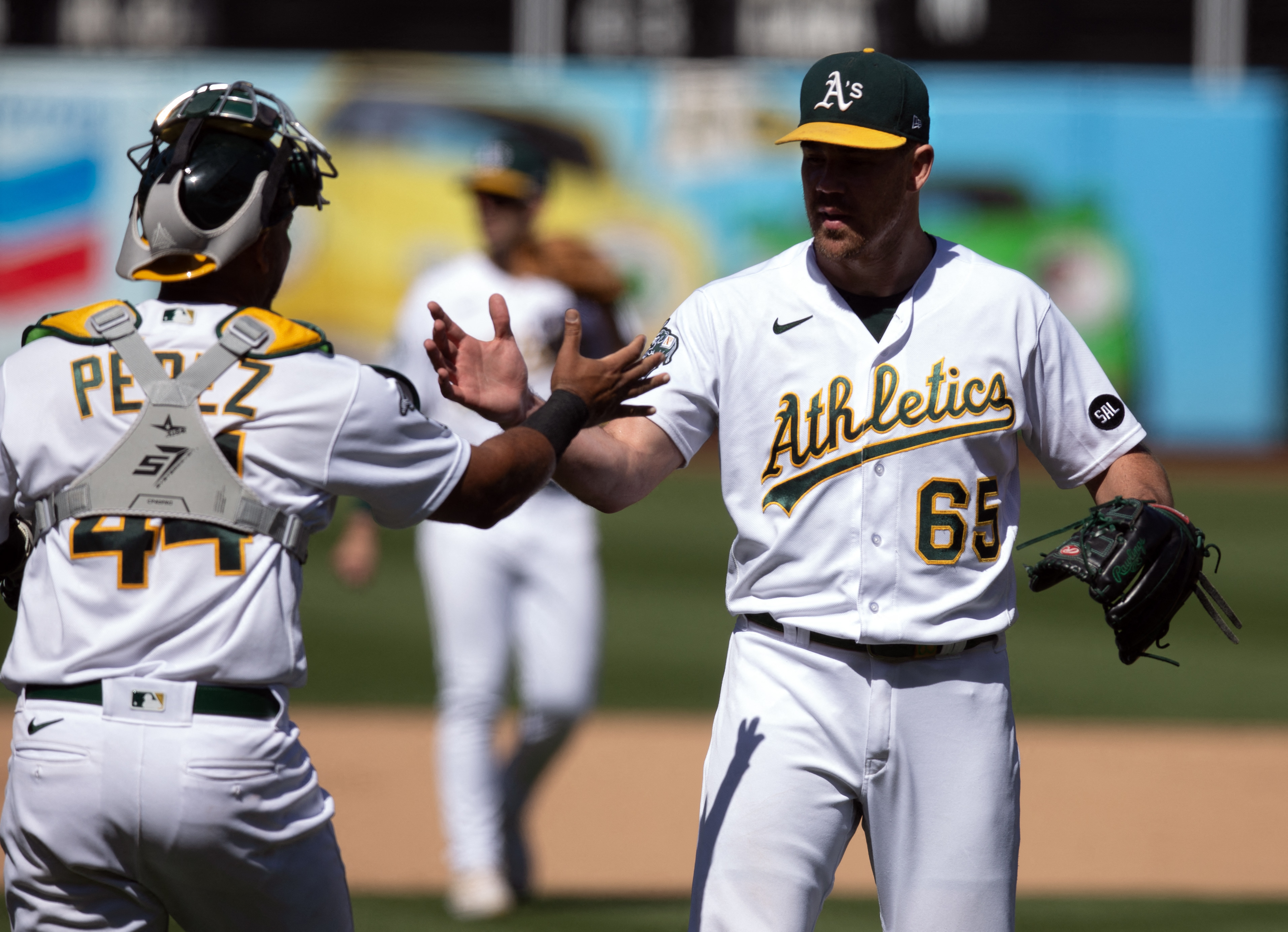 A's stunt Blue Jays' playoff push with 5-2 win