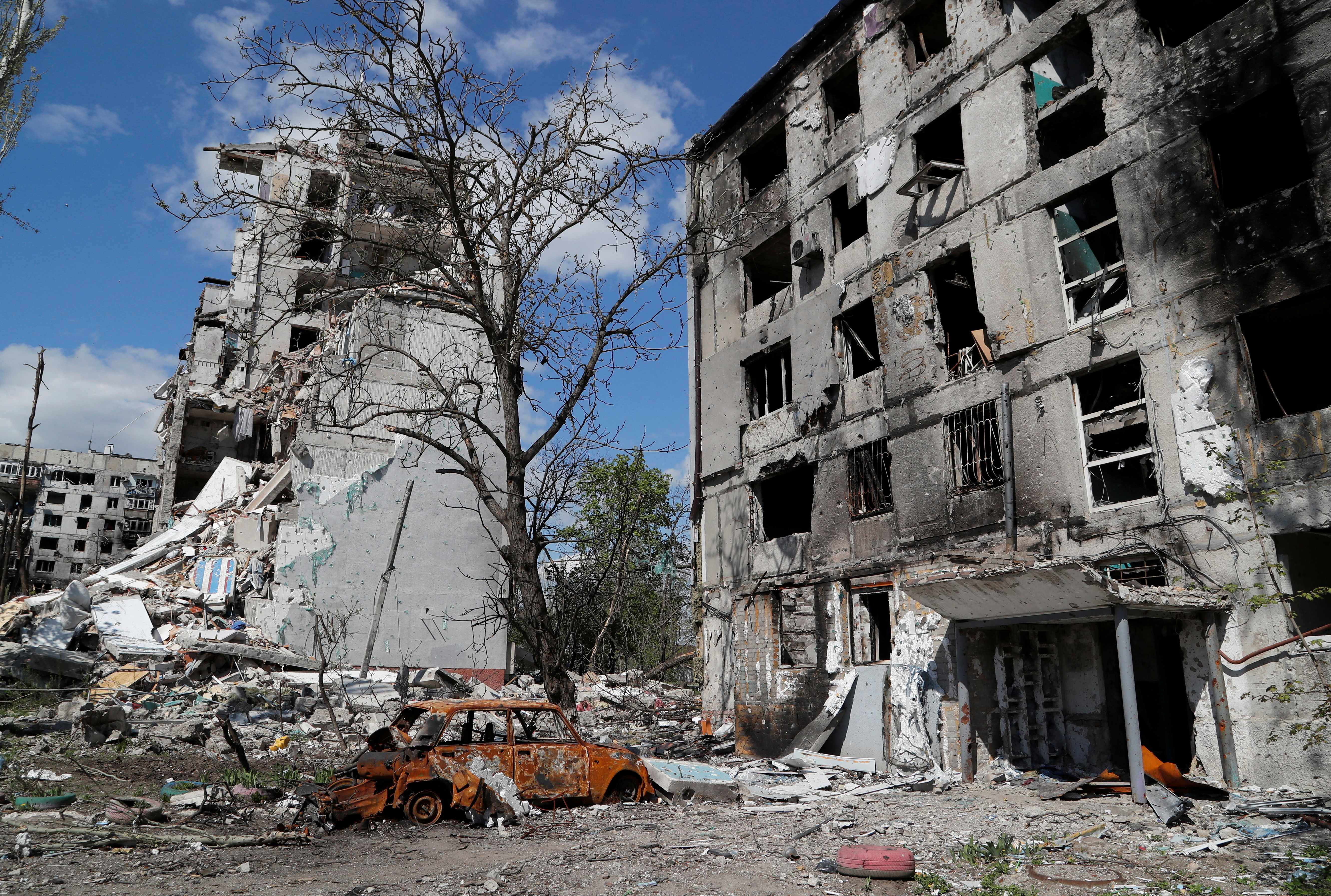 A view shows heavily damaged apartment buildings in Mariupol