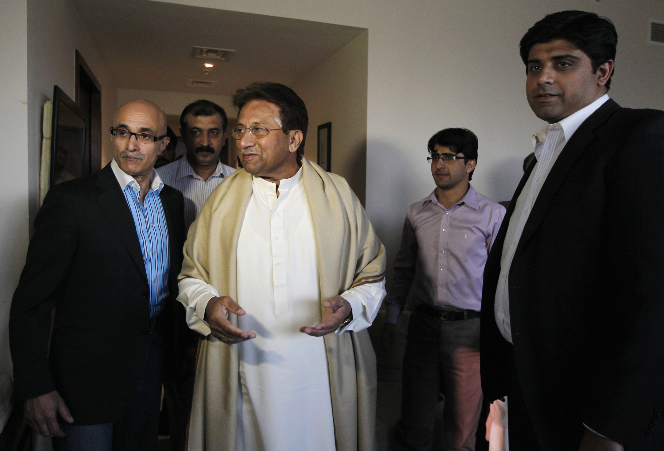 Former Pakistani President Musharraf arrives before his speech, in the commercial centre Karachi, Dubai