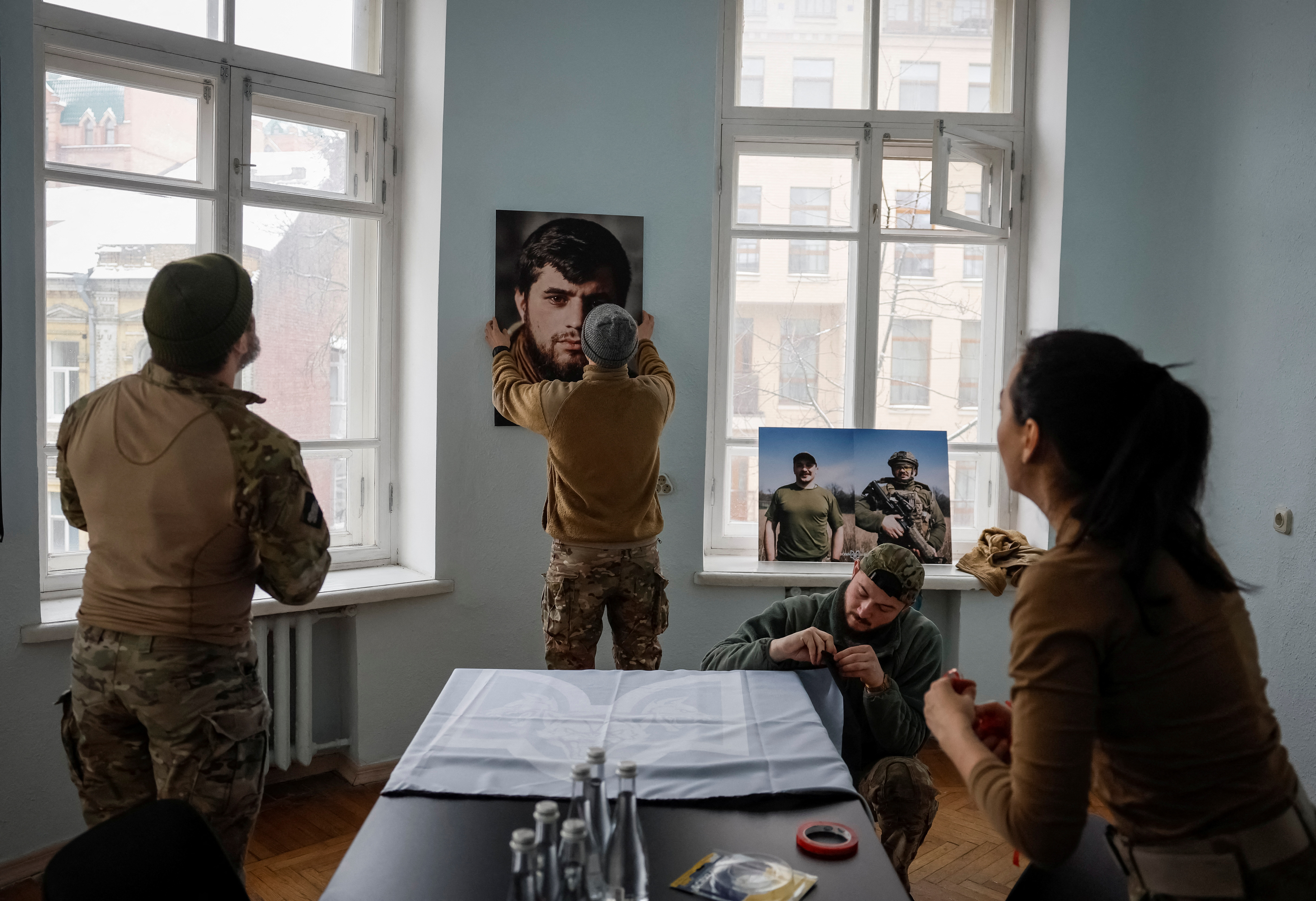 Servicemen of the a battalion 'Da Vinci's wolves' prepare a new recruiting center for opening in Kyiv