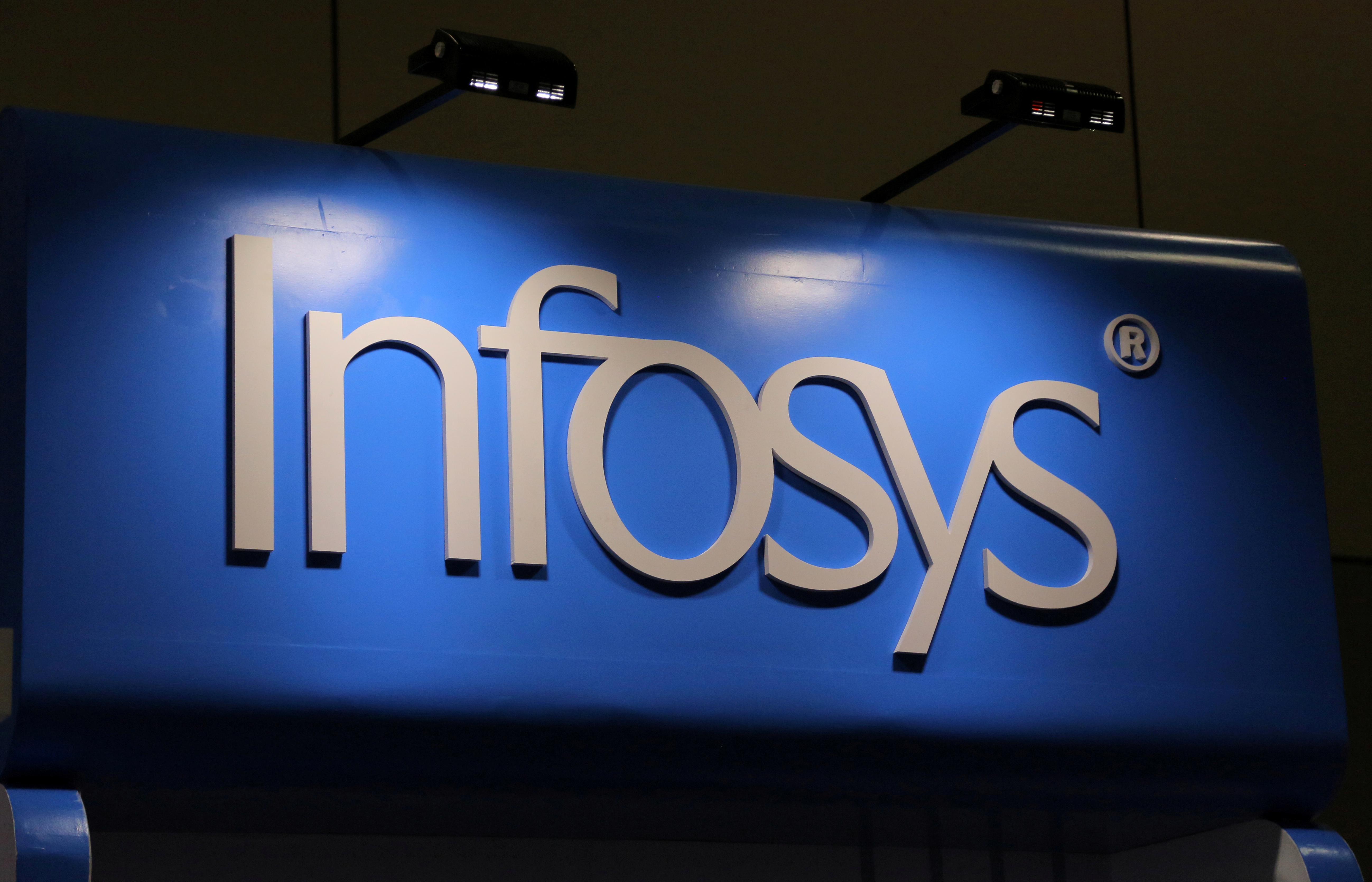 The Infosys logo is seen at the SIBOS banking and financial conference in Toronto, Ontario, Canada October 19, 2017. Picture taken October 19, 2017. REUTERS/Chris Helgren/File Photo