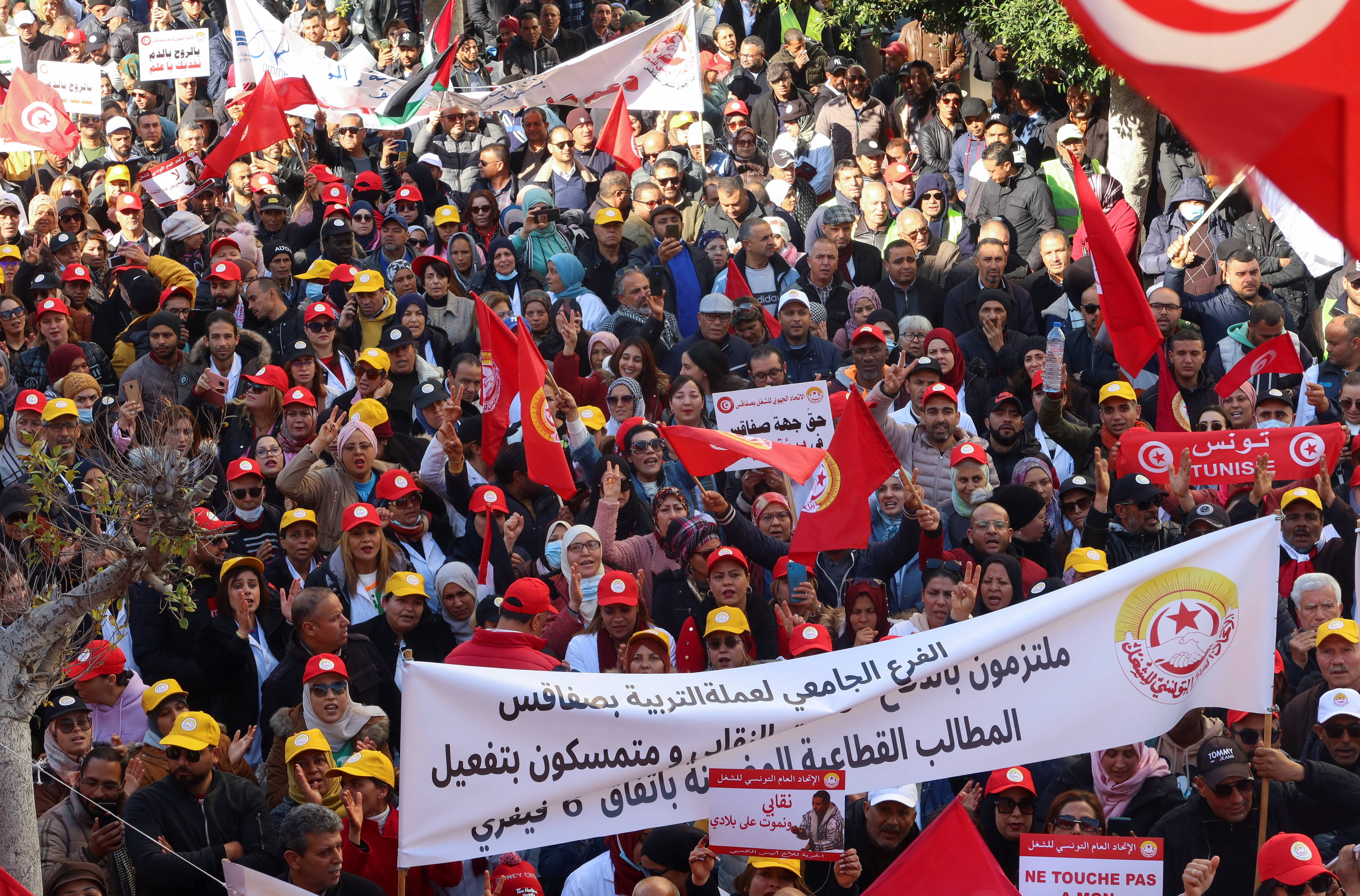 Supporters of the Tunisian General Labour Union (UGTT) protest in Sfax