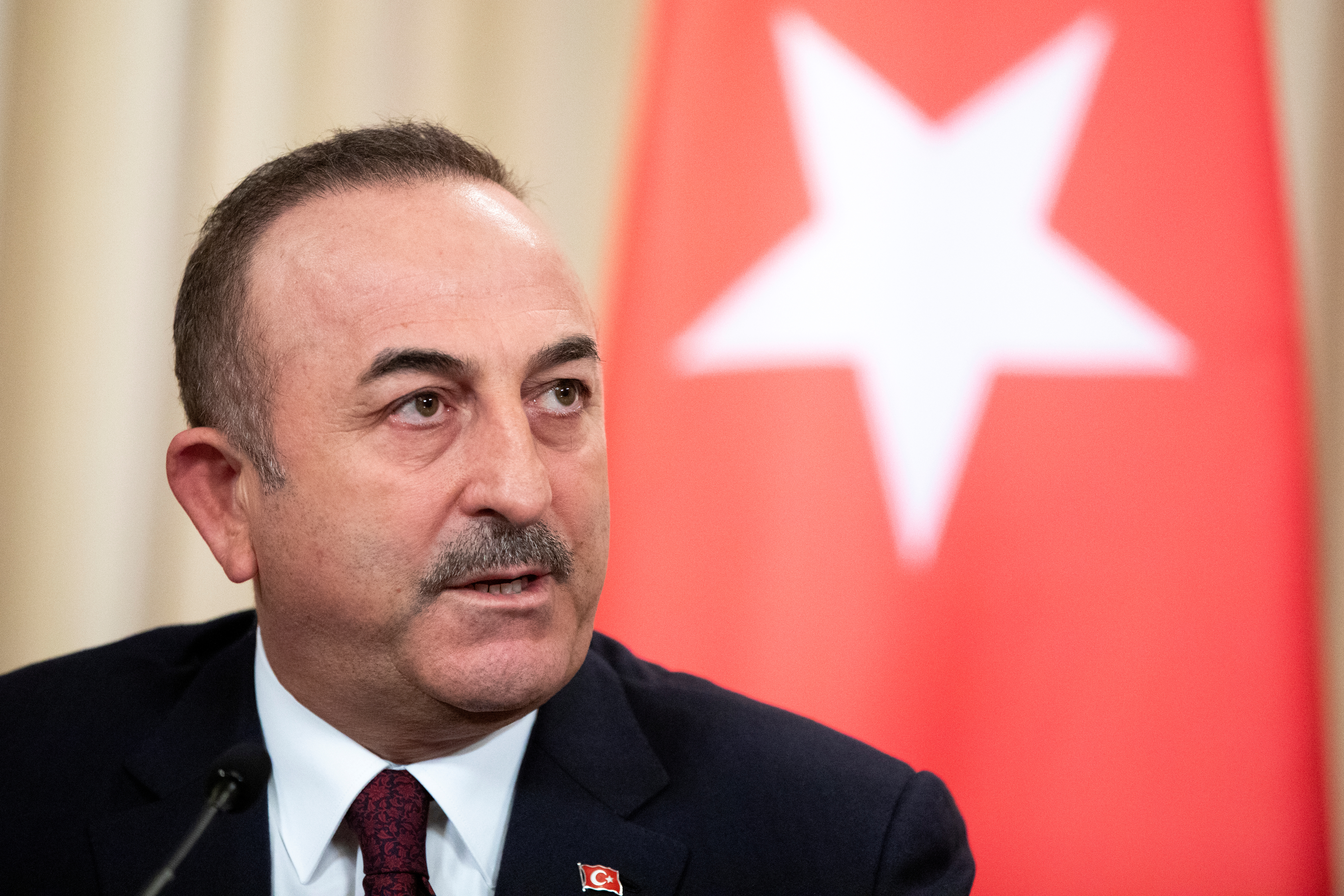Turkish Foreign Minister Mevlut Cavusoglu speaks during a joint news conference following talks with Russian Foreign Minister Sergei Lavrov in Moscow