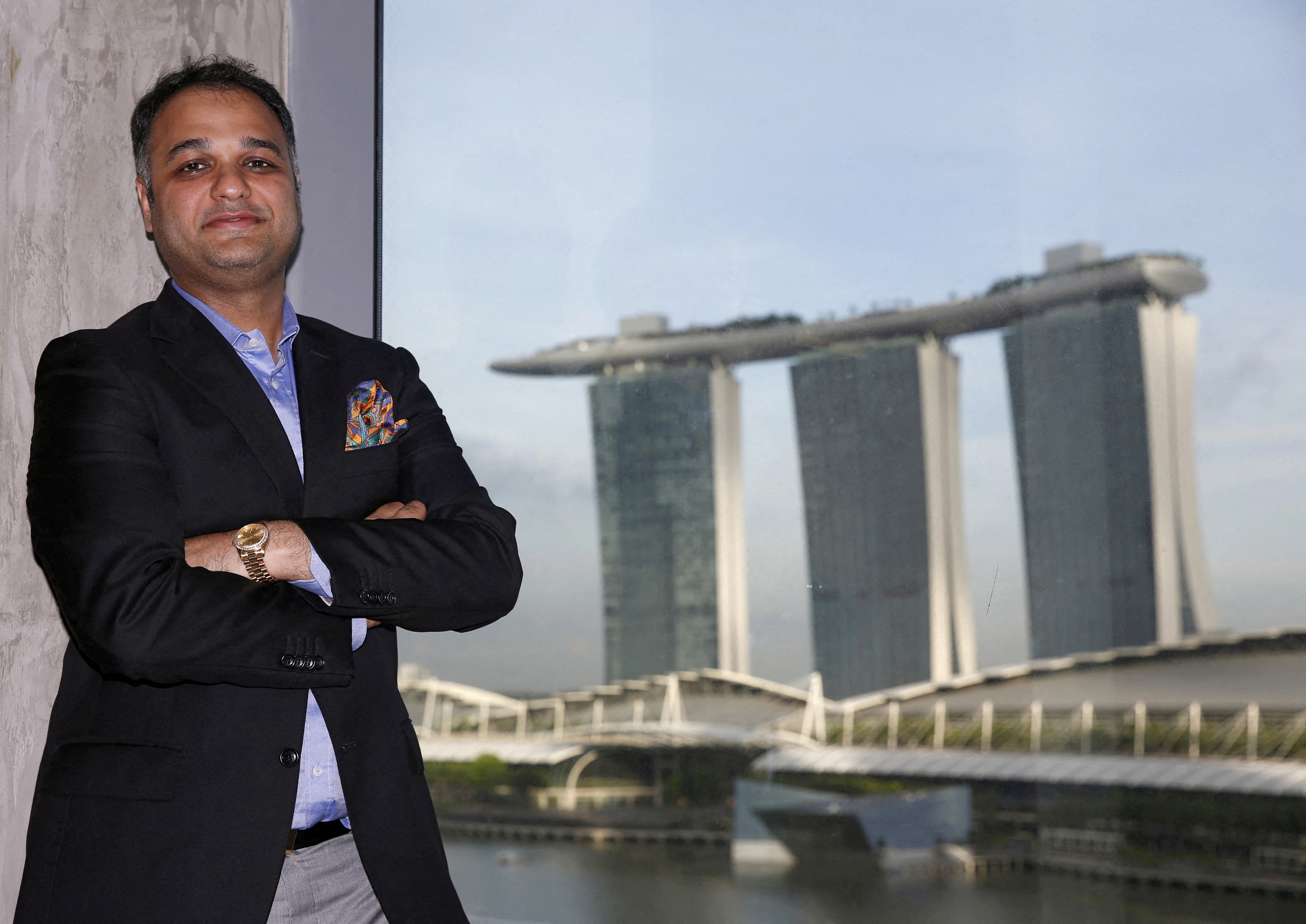 Chairman of UD Group Prateek Gupta poses in his Singapore office
