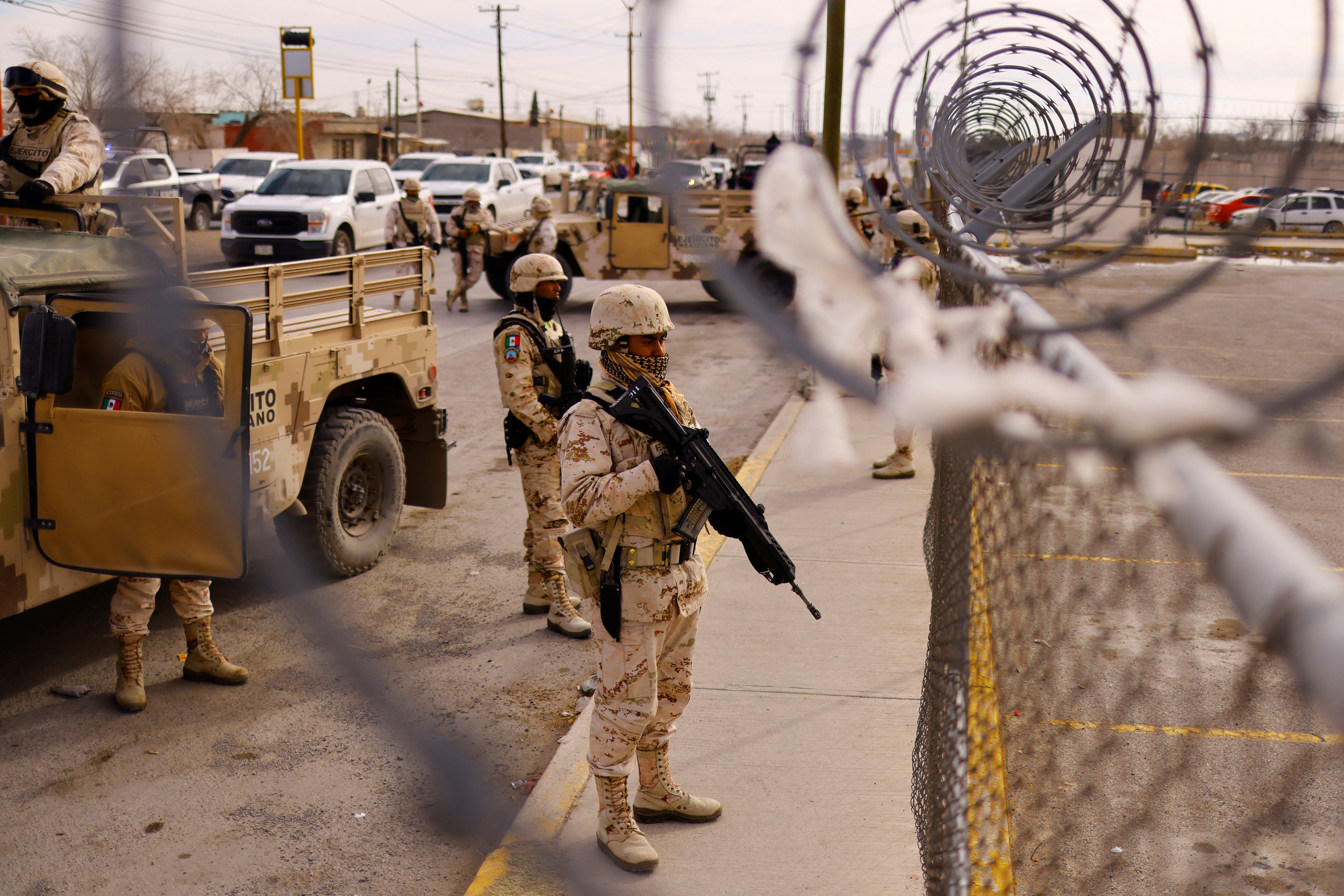 Members of the Mexican Army arrive at Cereso number 3 state prison after unknown assailants entered the prison and freed several inmates, resulting in injuries and deaths, in Ciudad Juarez