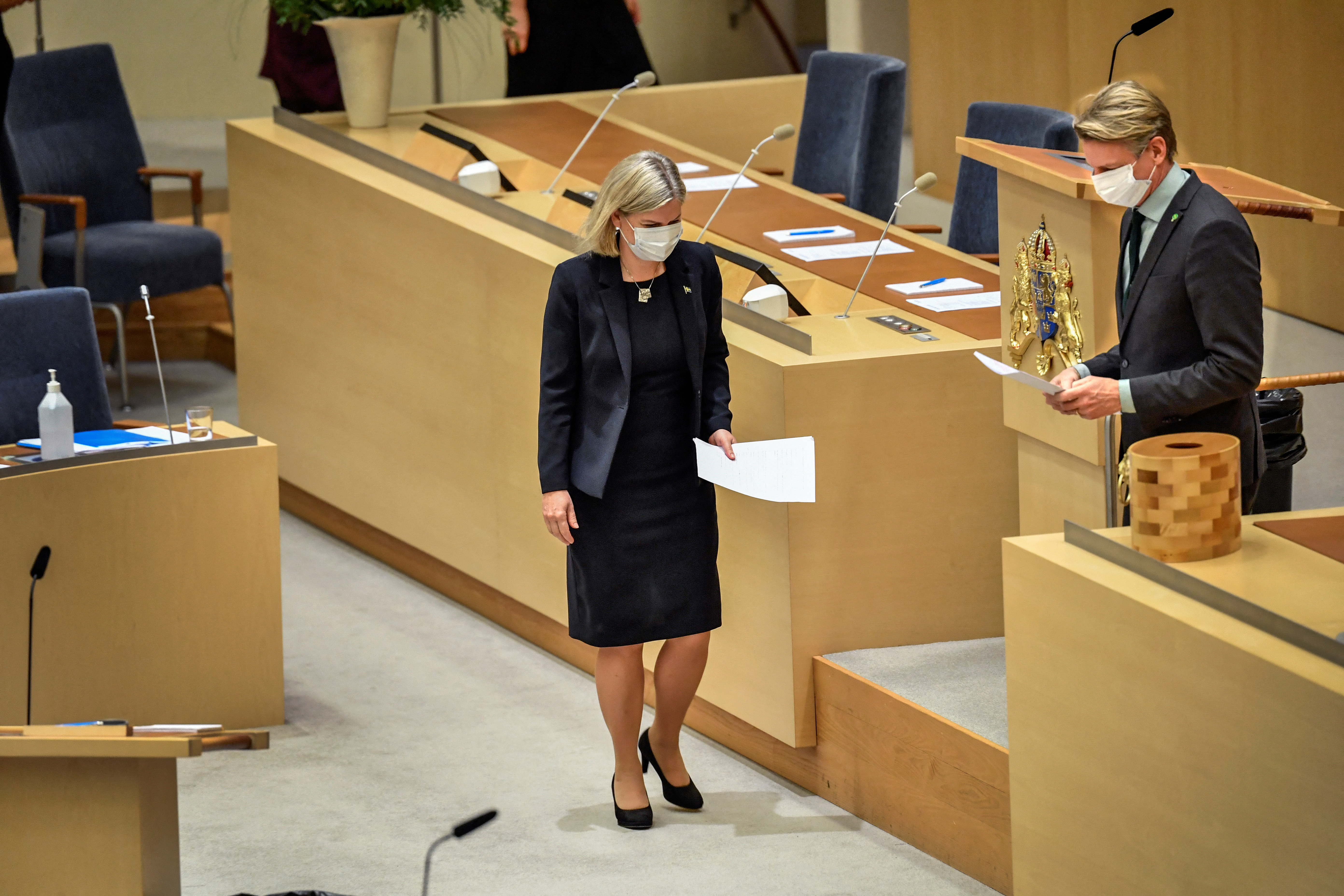 Swedish Prime Minister Magdalena Andersson and Green Party Leader Per Bolund are pictured during a parliamentary debate in Swedish parliament Riksdagen