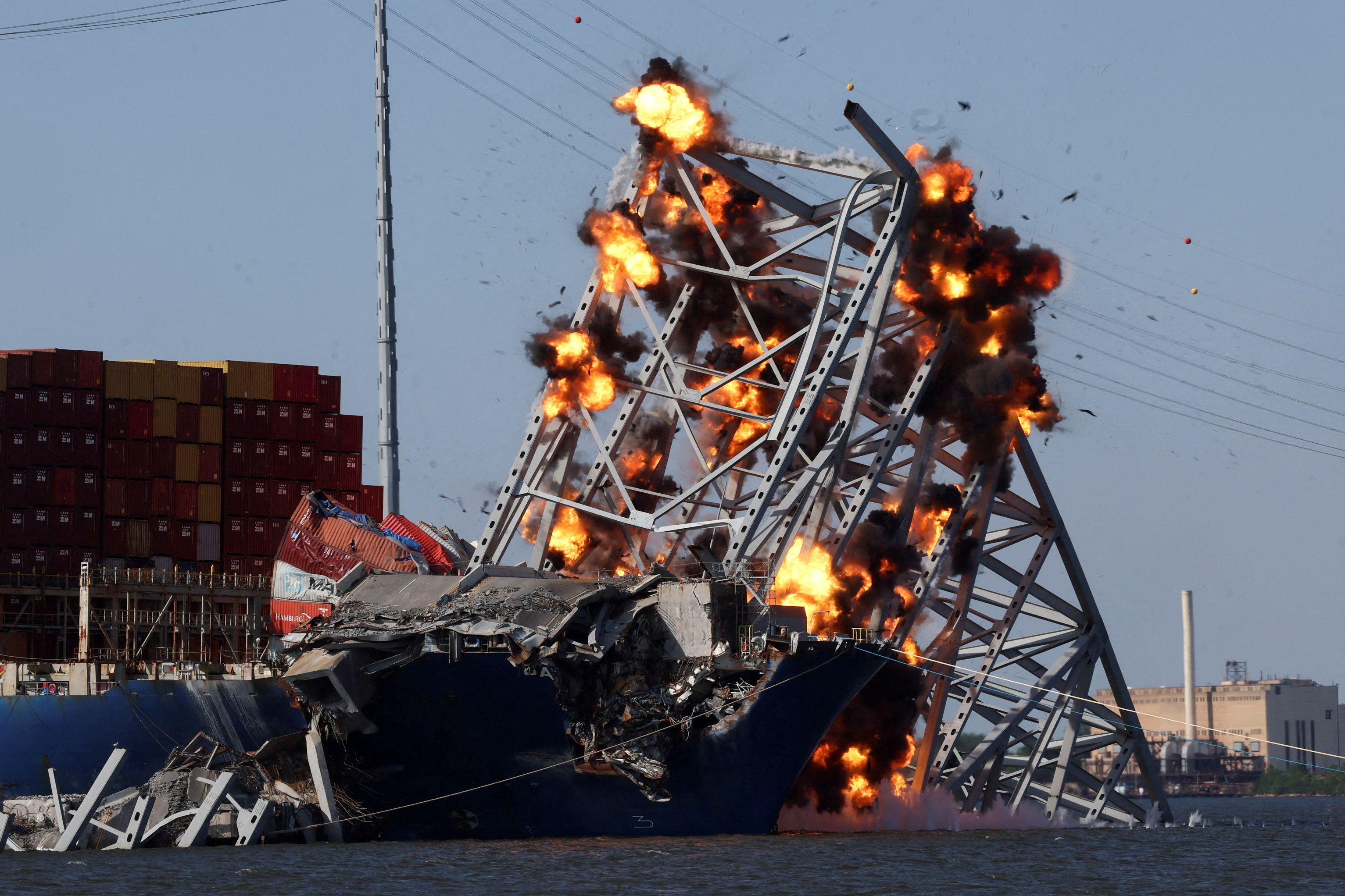 Explosives are detonated to free container ship Dali from Baltimore bridge collapse, in Baltimore
