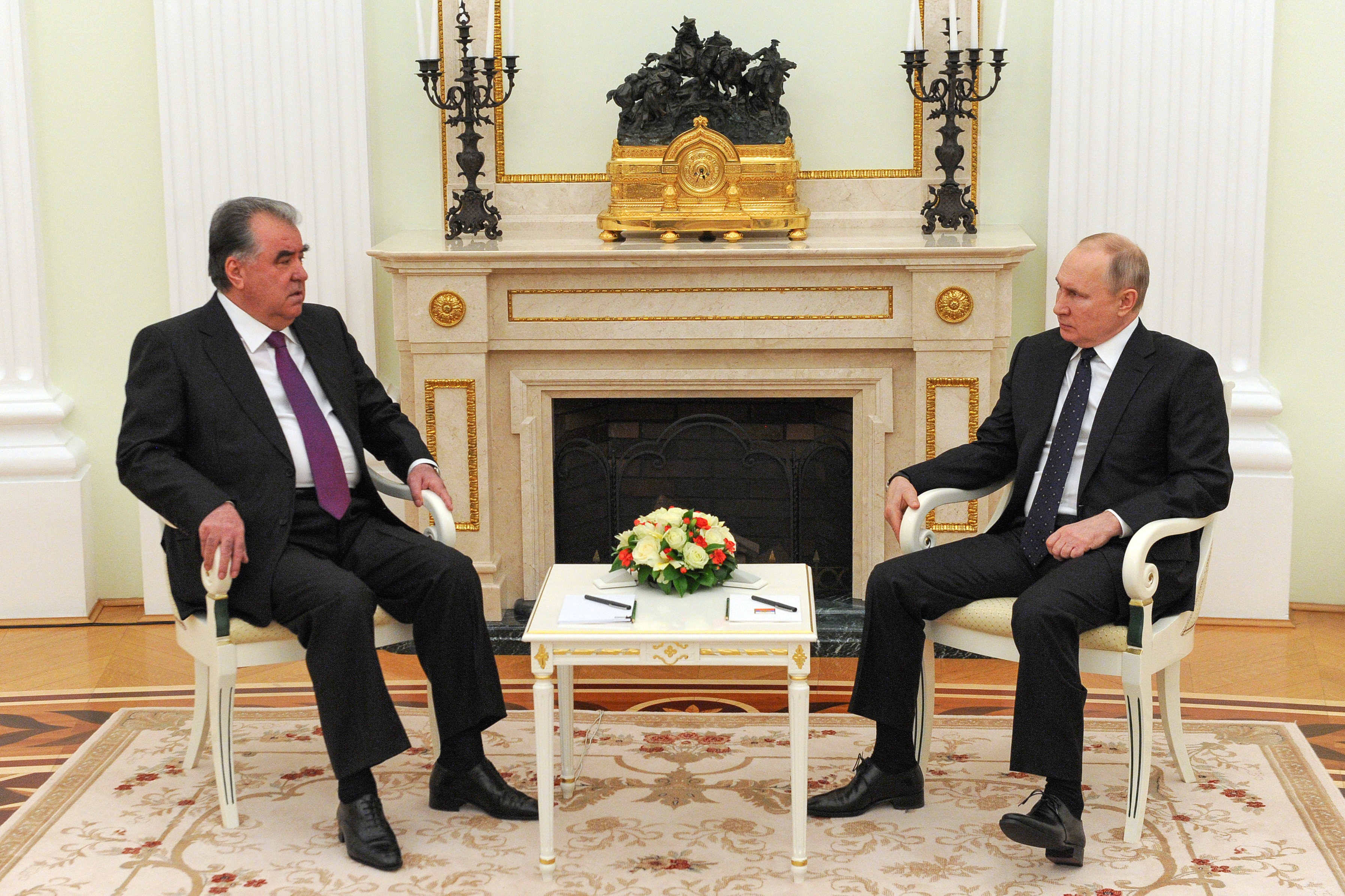 Russian President Vladimir Putin attends a meeting with his Tajik counterpart Emomali Rakhmon in Moscow