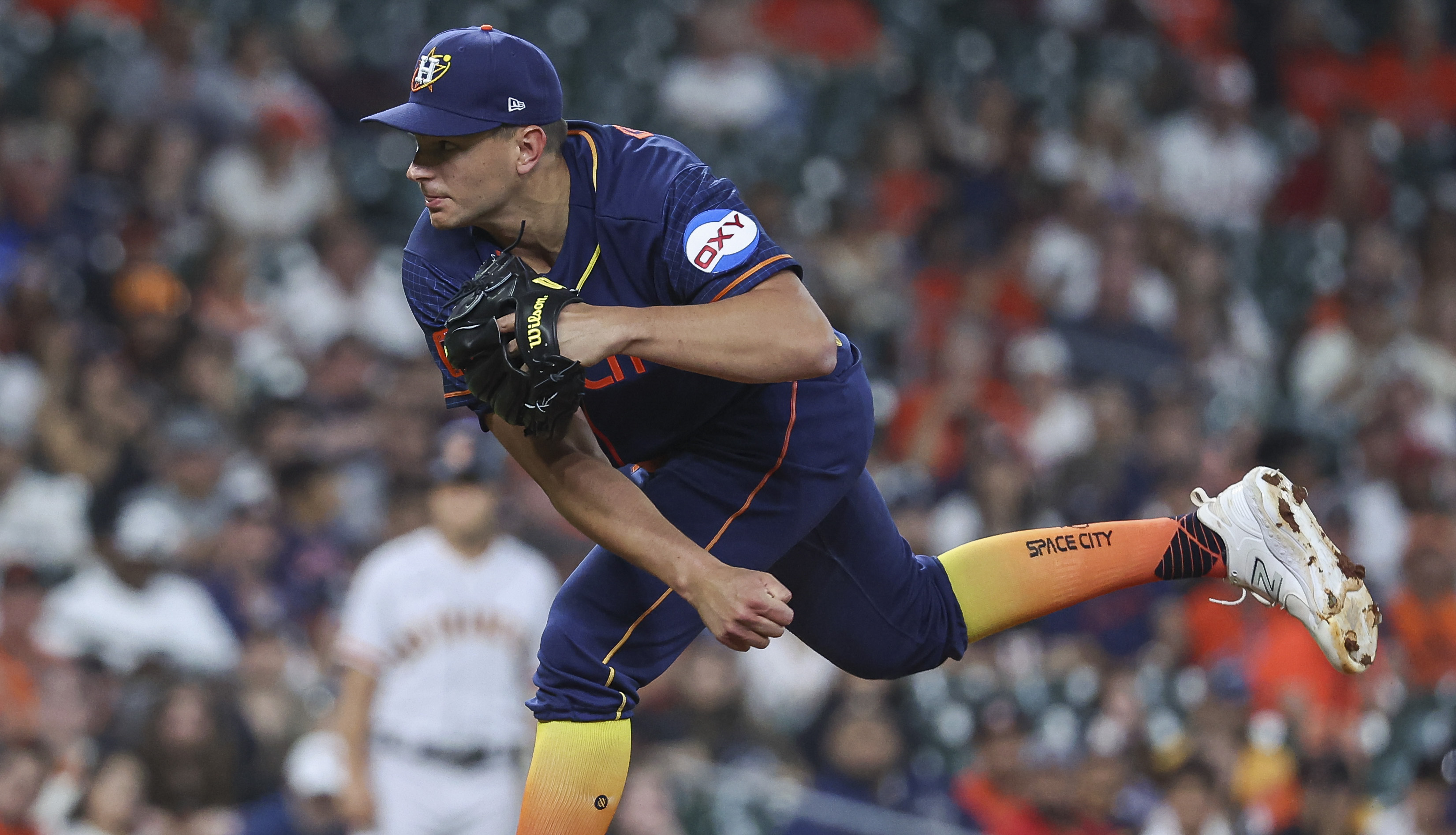 Luis Garcia exits early, but Astros still handle Giants