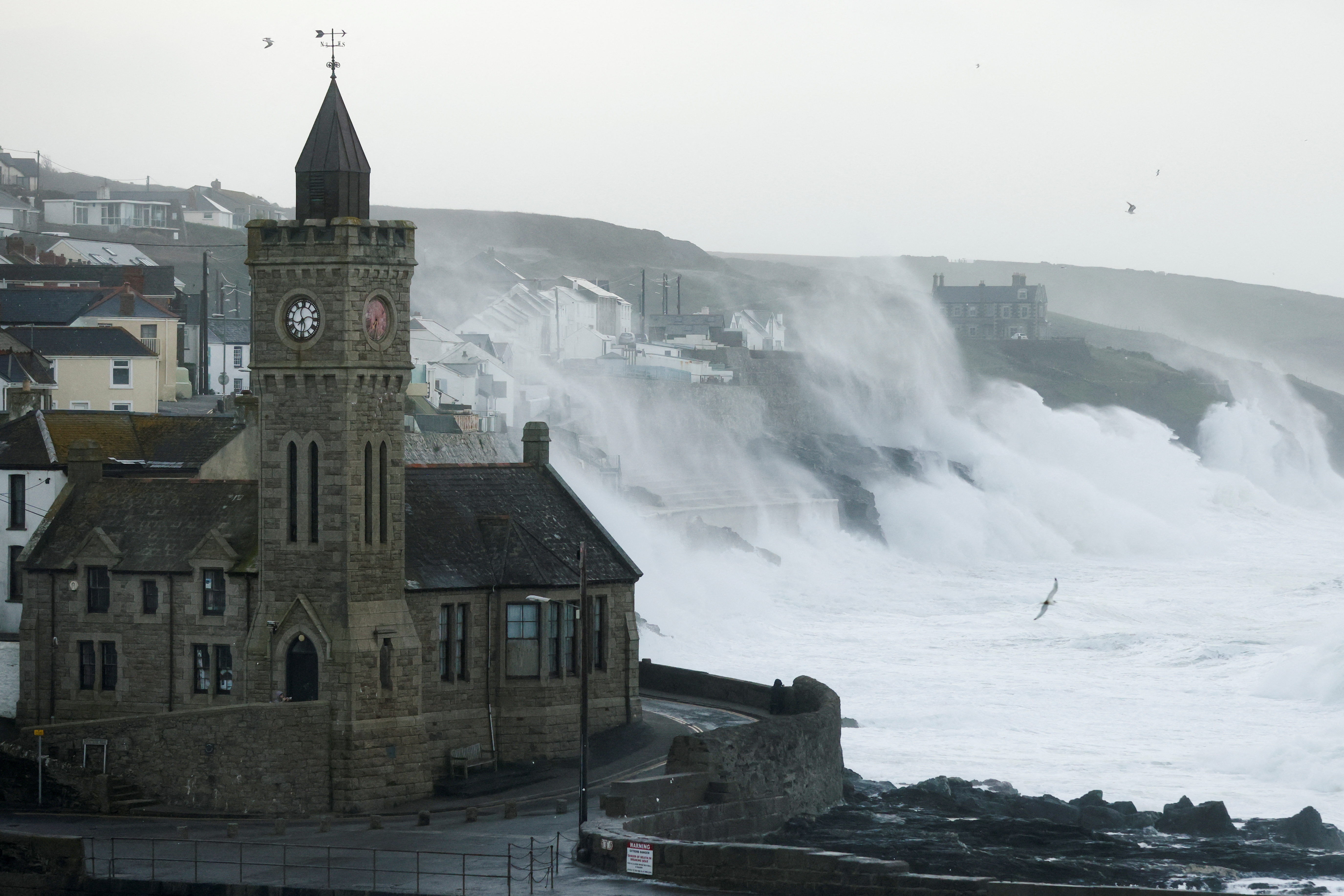 Large waves and strong winds hit during Storm Eunice, in Porthleven, Cornwall, Britain, February 18, 2022. REUTERS/Tom Nicholson