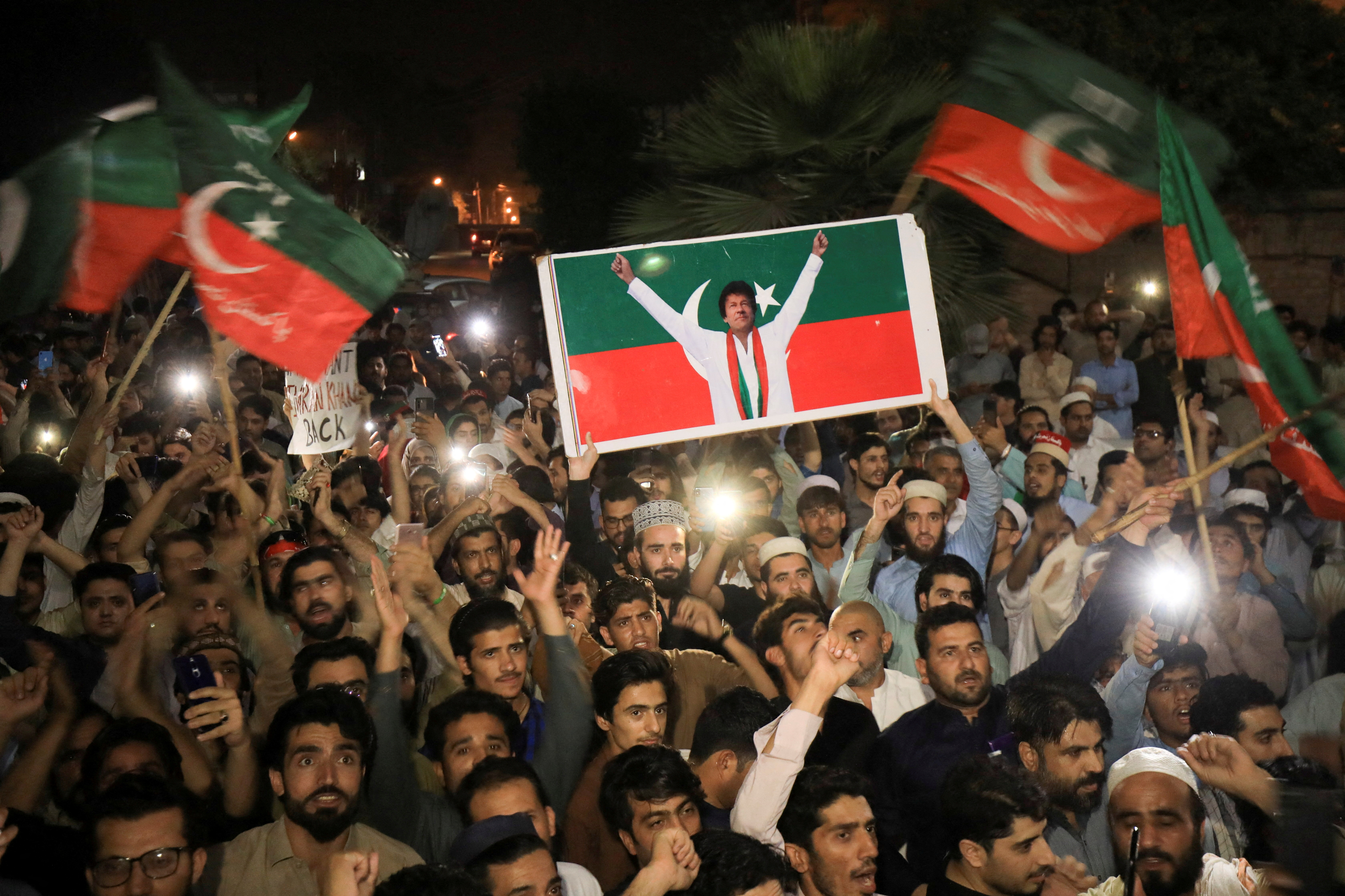People rally in support of former Pakistani Prime Minister Imran Khan, in Peshawar