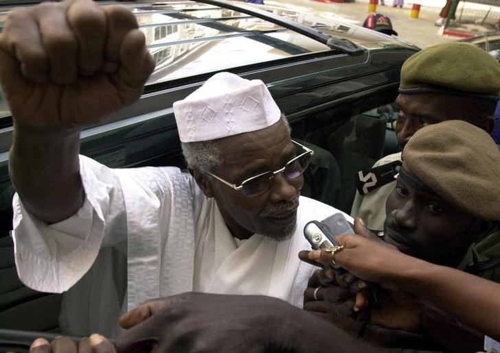 Former Chad President Habre makes declarations to media as he leaves a court in Dakar, Senegal
