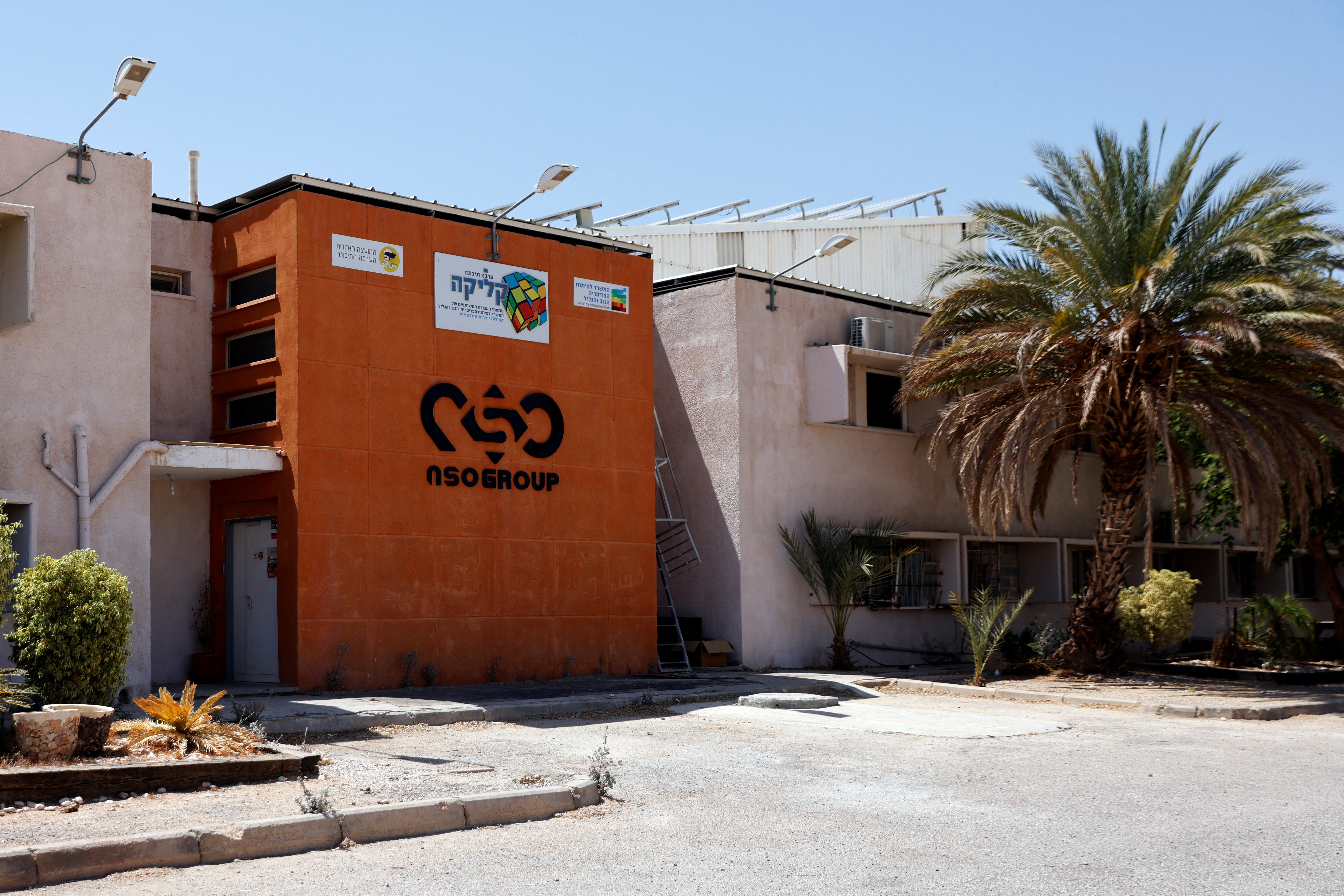 The logo of Israeli cyber firm NSO Group is seen at one of its branches in the Arava Desert, southern Israel