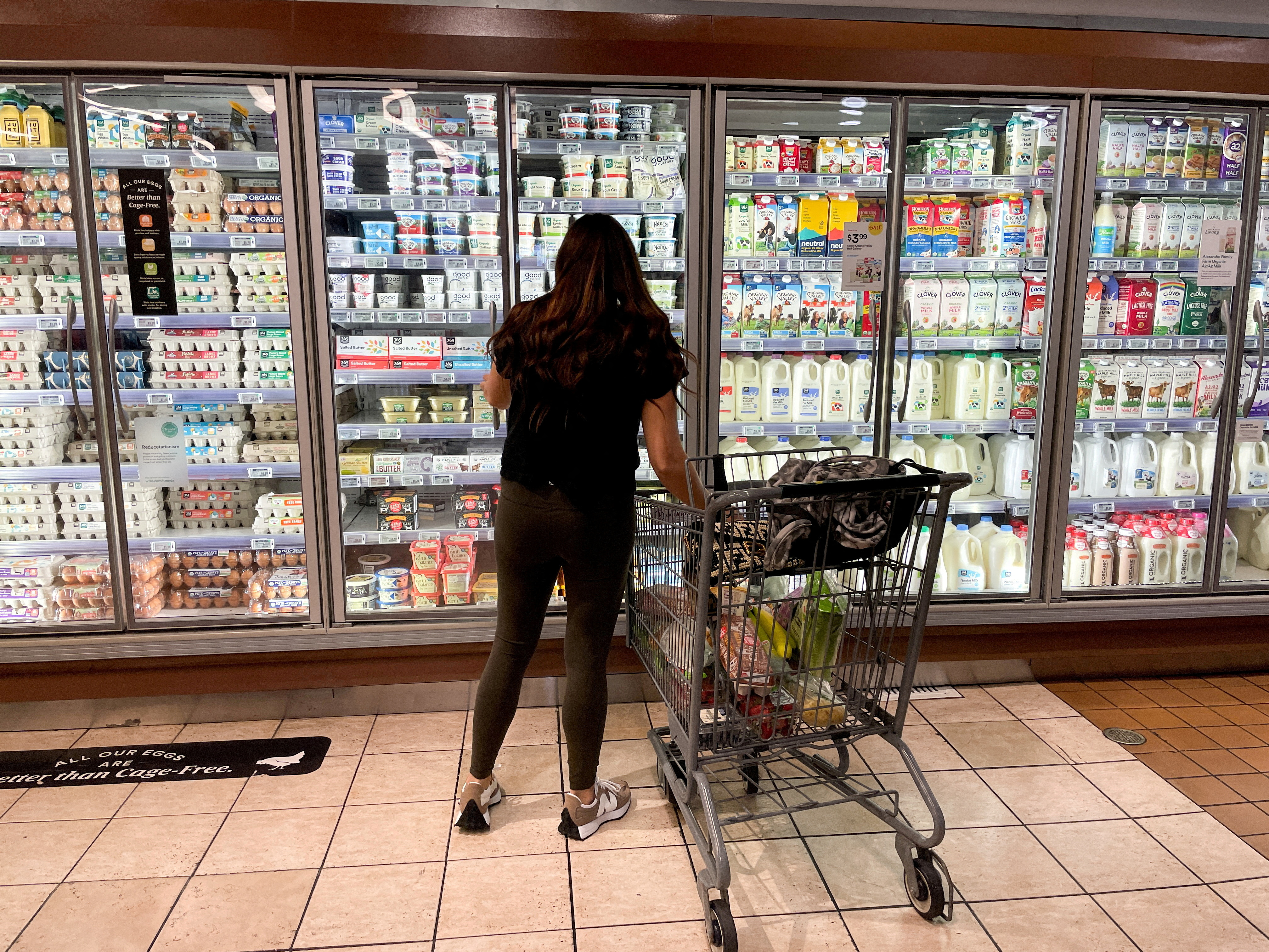 A woman shops in a supermarket in Los Angeles