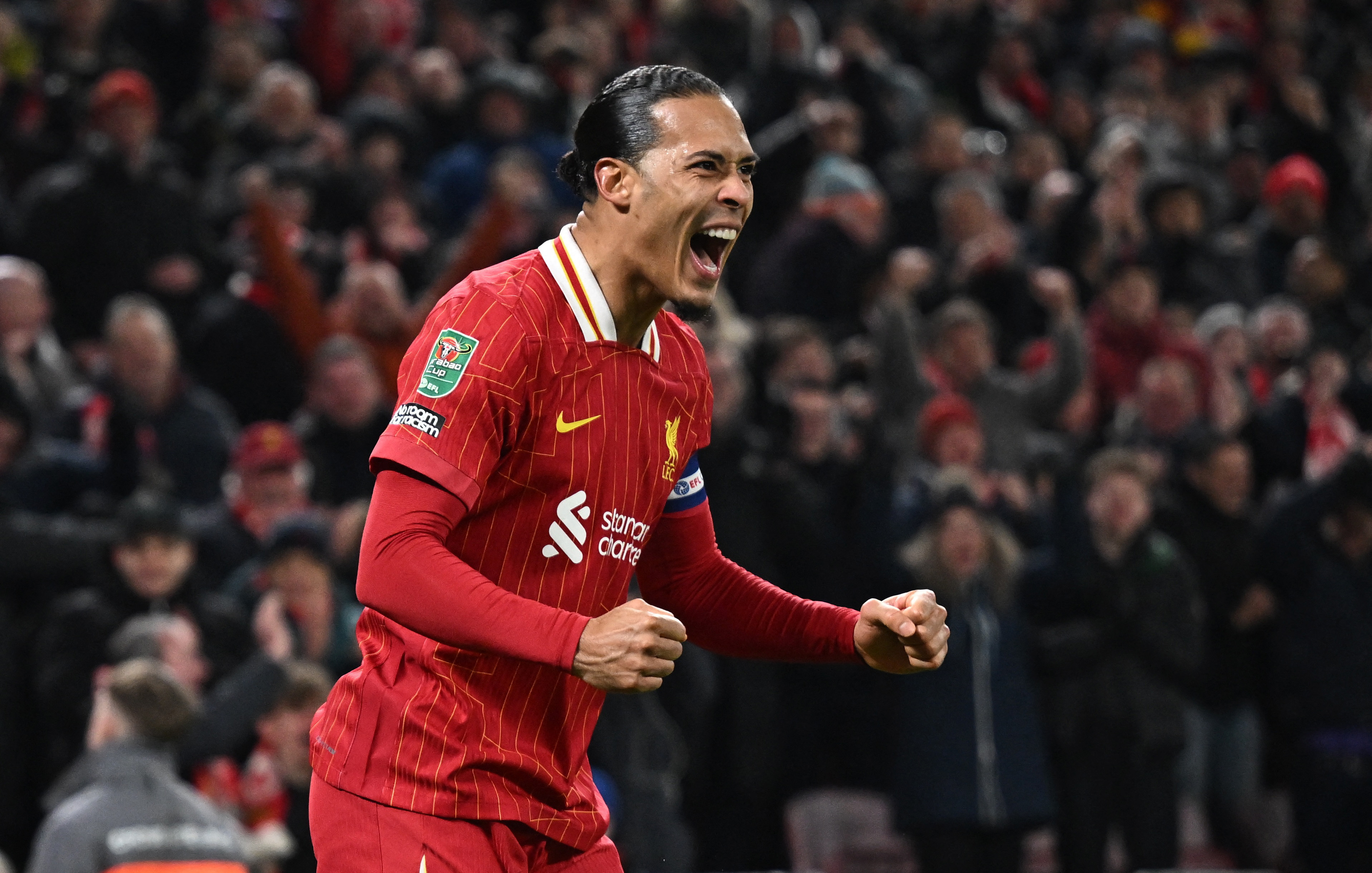 Van Dijk downplays Liverpool's quadruple hopes after reaching League Cup final | Reuters