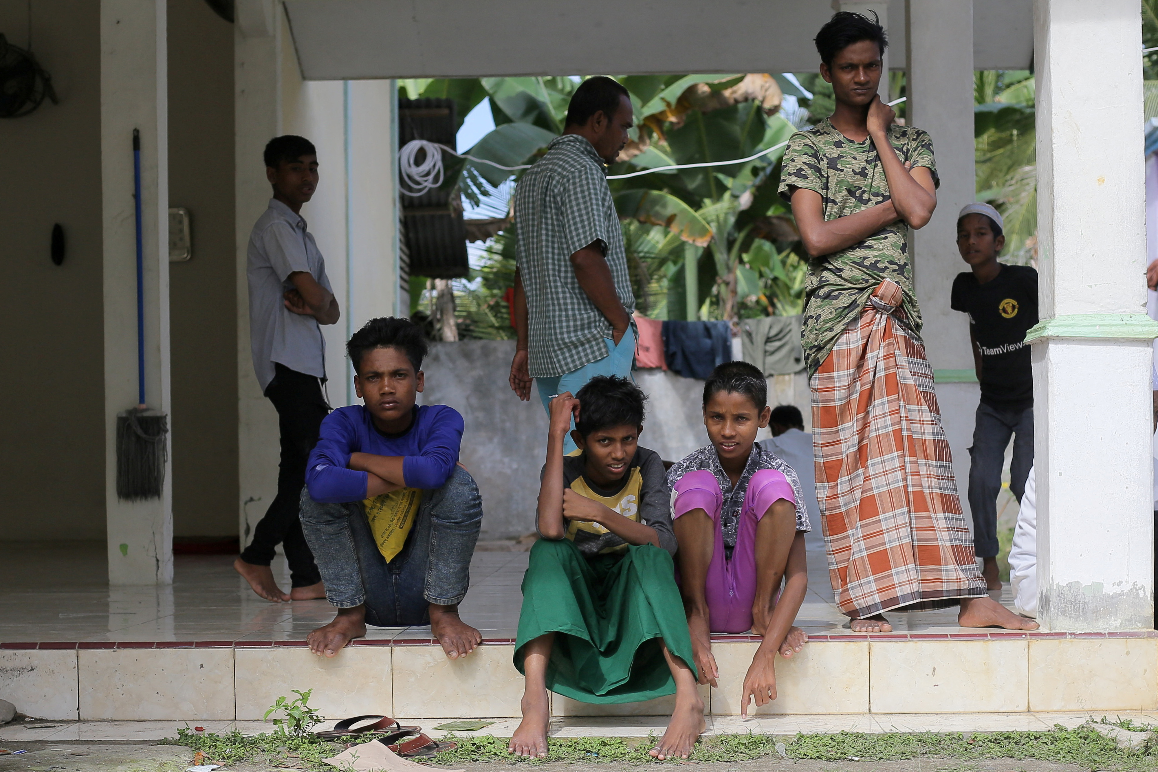 Rohingya refugees in a temporary shelter as 114 were brought to the shore of Indonesia