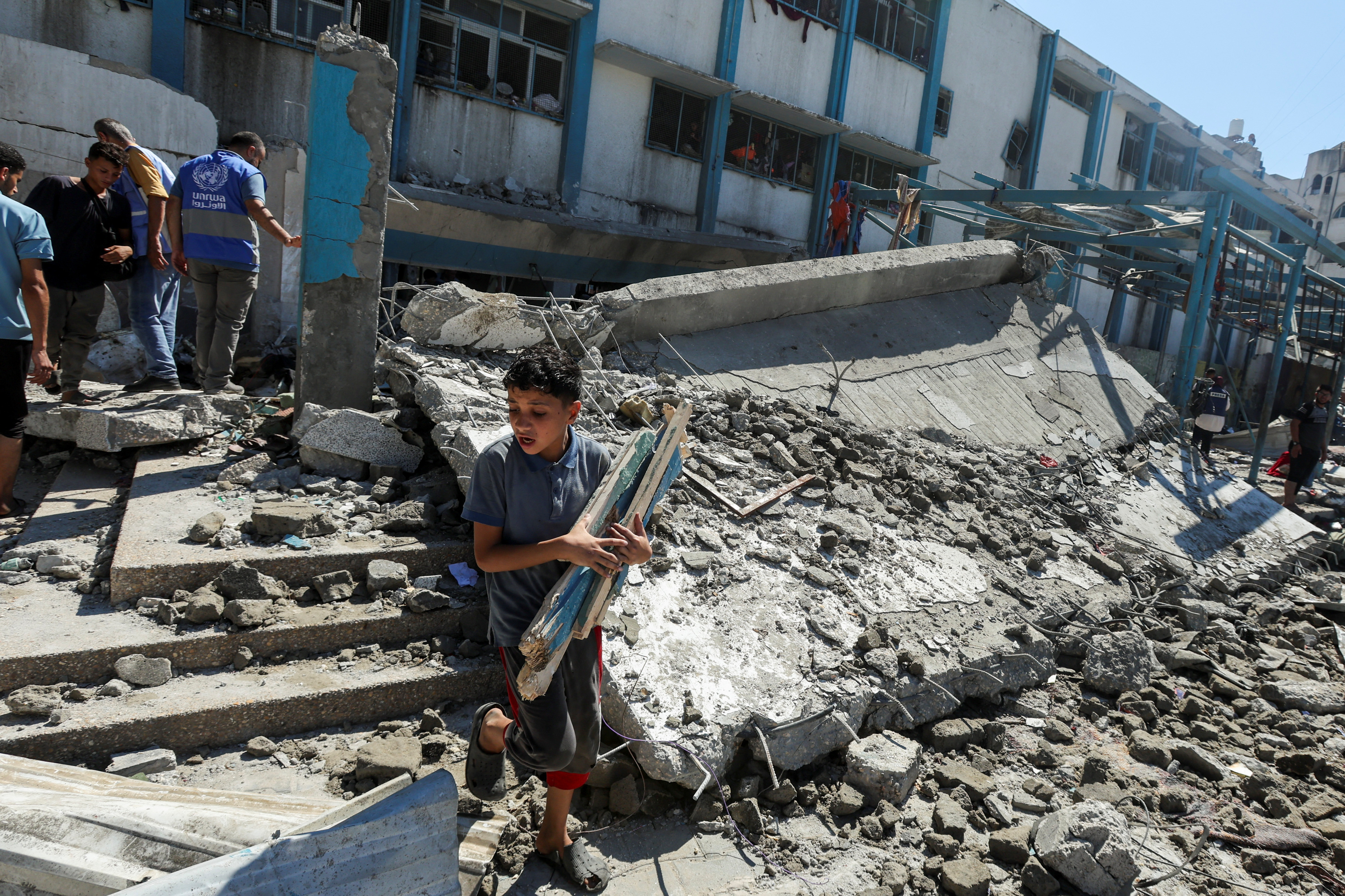 Aftermath of Israeli strike on UN school sheltering displaced people, in Nuseirat in the central Gaza Strip
