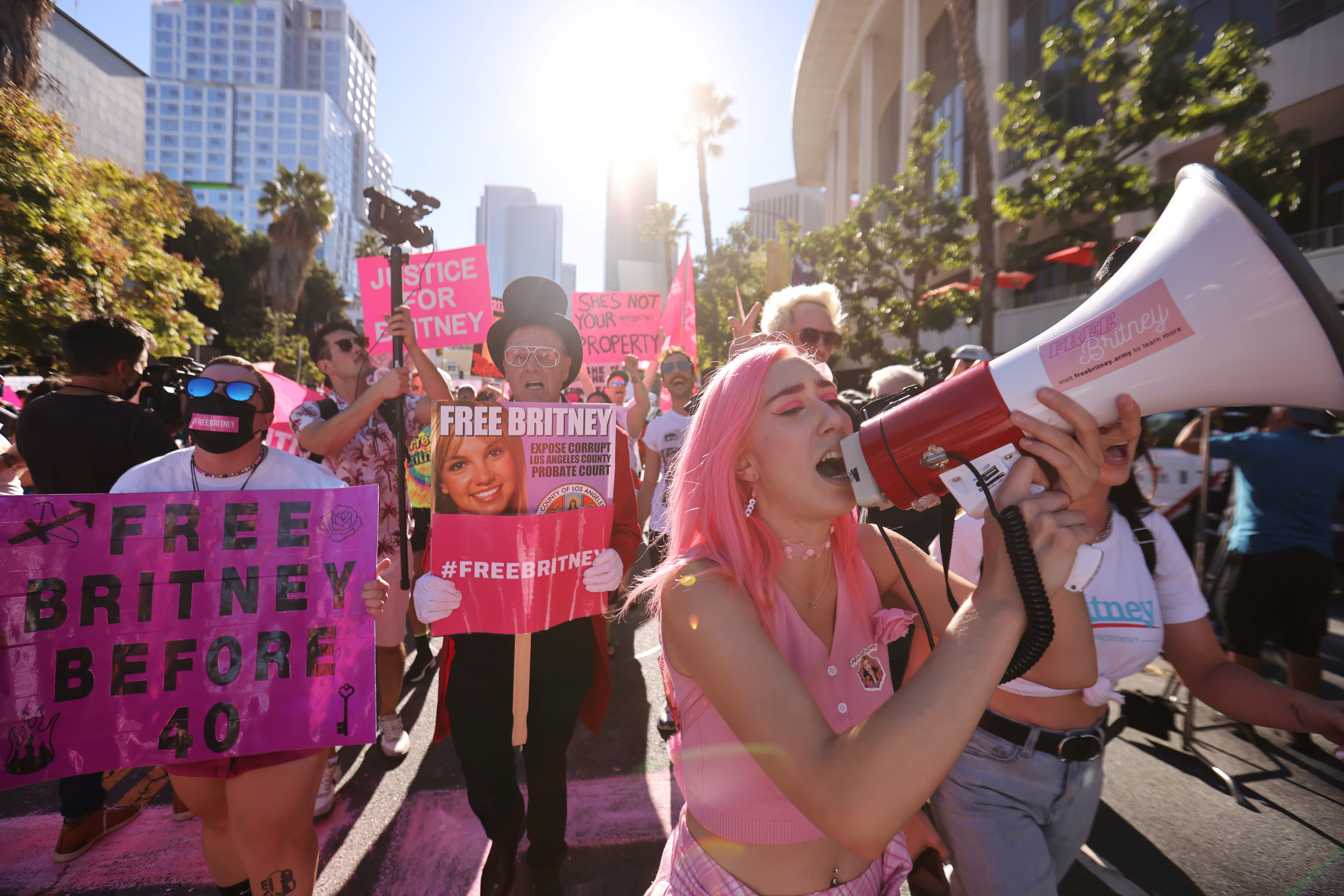 Supporters of singer Britney Spears gather outside the Stanley Mosk Courthouse on the day of her conservatorship case hearing, in Los Angeles, California, U.S. November 12, 2021. REUTERS/Mike Blake