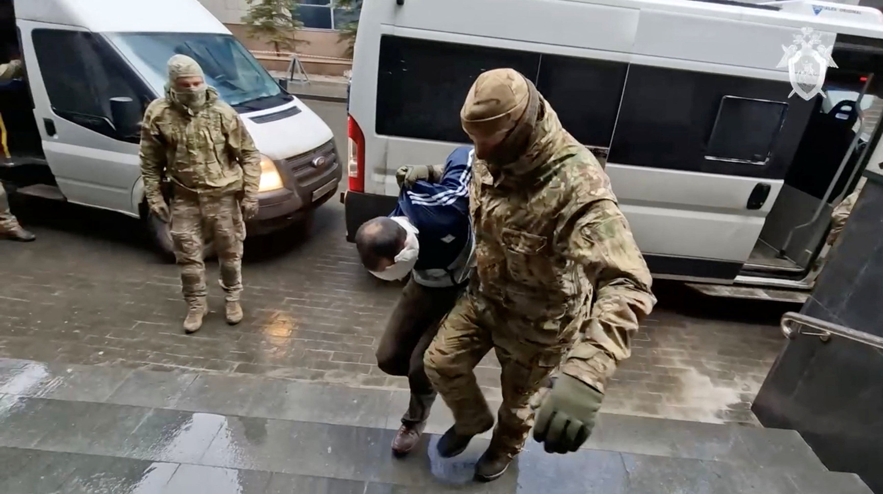 Suspects in the Crocus City Hall shooting are brought to the Investigation Committee's headquarters in Moscow
