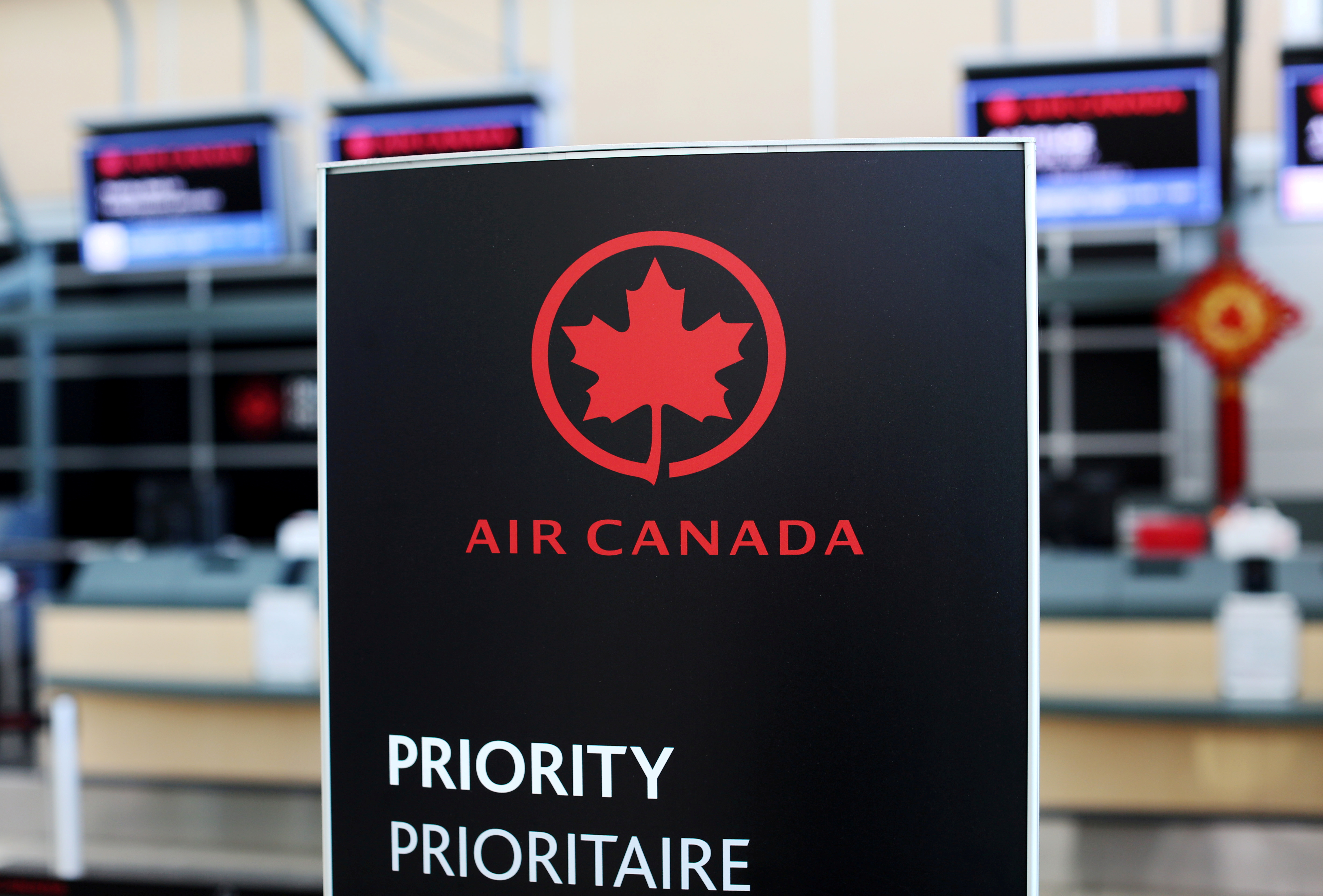 Air Canada signage is pictured at Vancouver's international airport in Richmond,