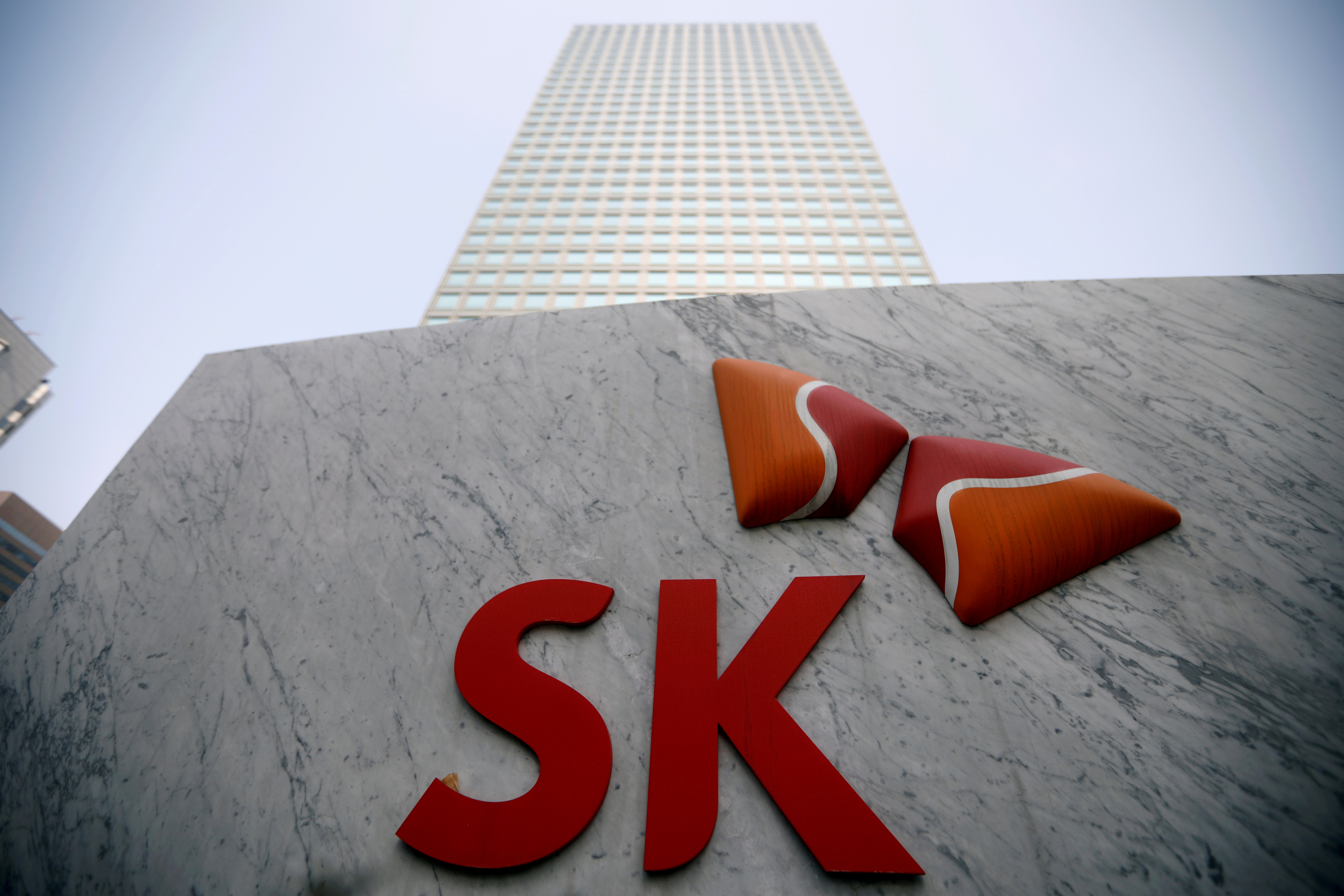 The logo of SK Innovation is seen in front of its headquarters in Seoul