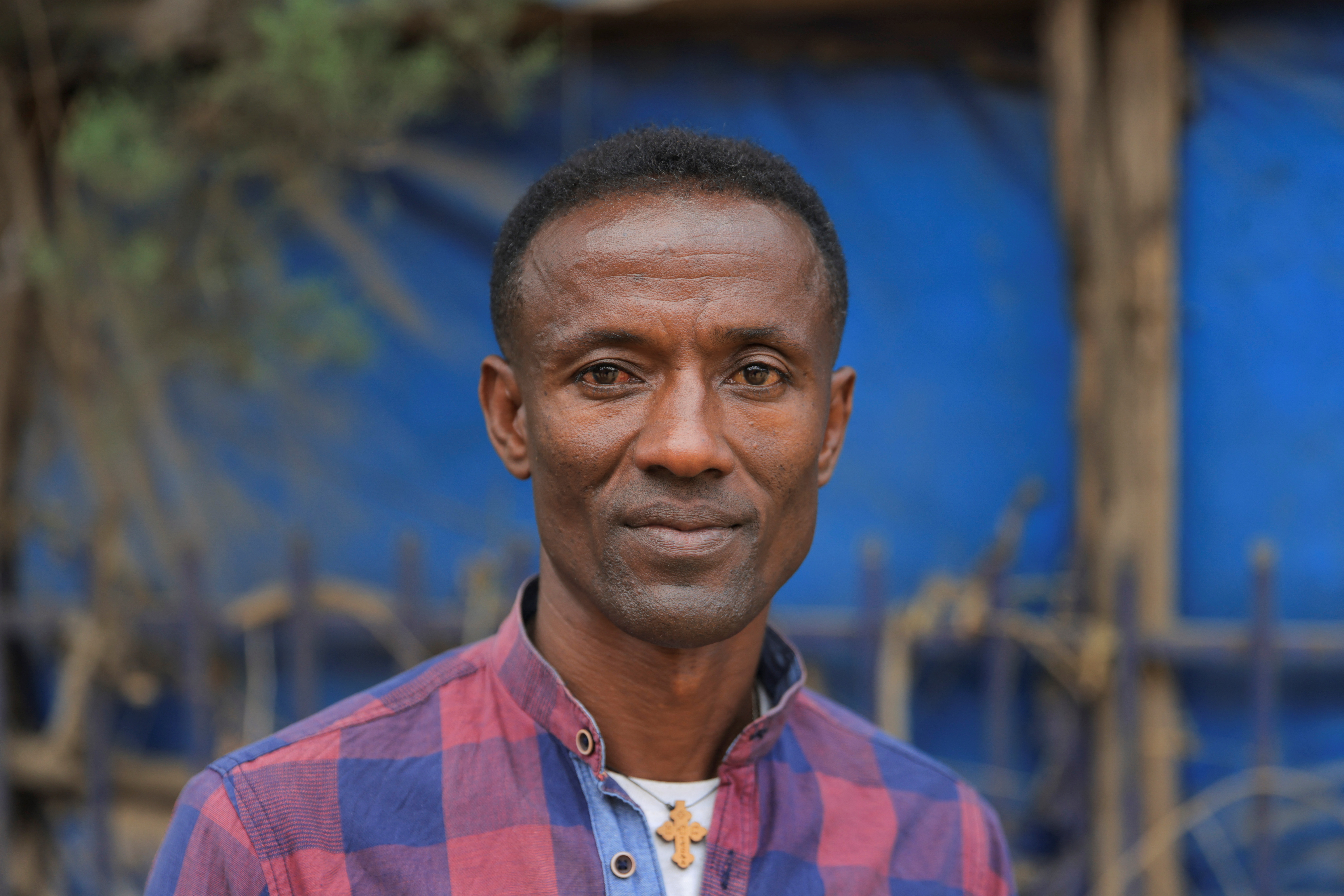 Former soldier with the ENDF poses for a photo in Addis Ababa