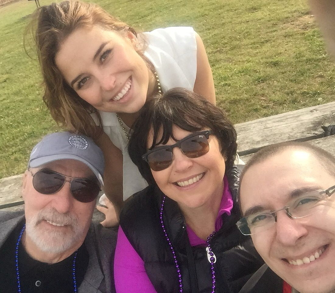 A portrait of Ksenia Karelina with her former in-laws and ex-husband in Maryland