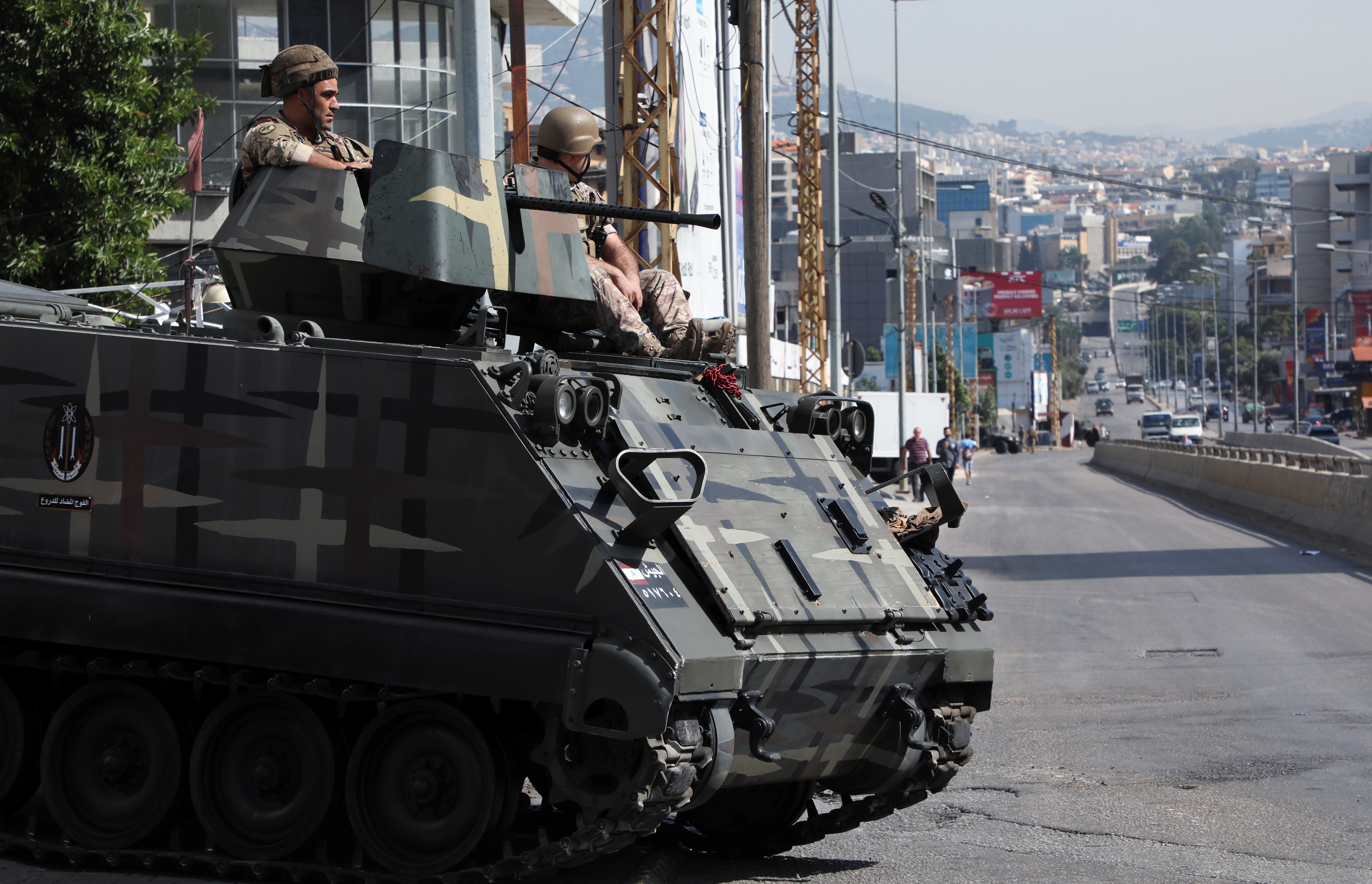 Army soldiers are deployed after gunfire erupted in Beirut