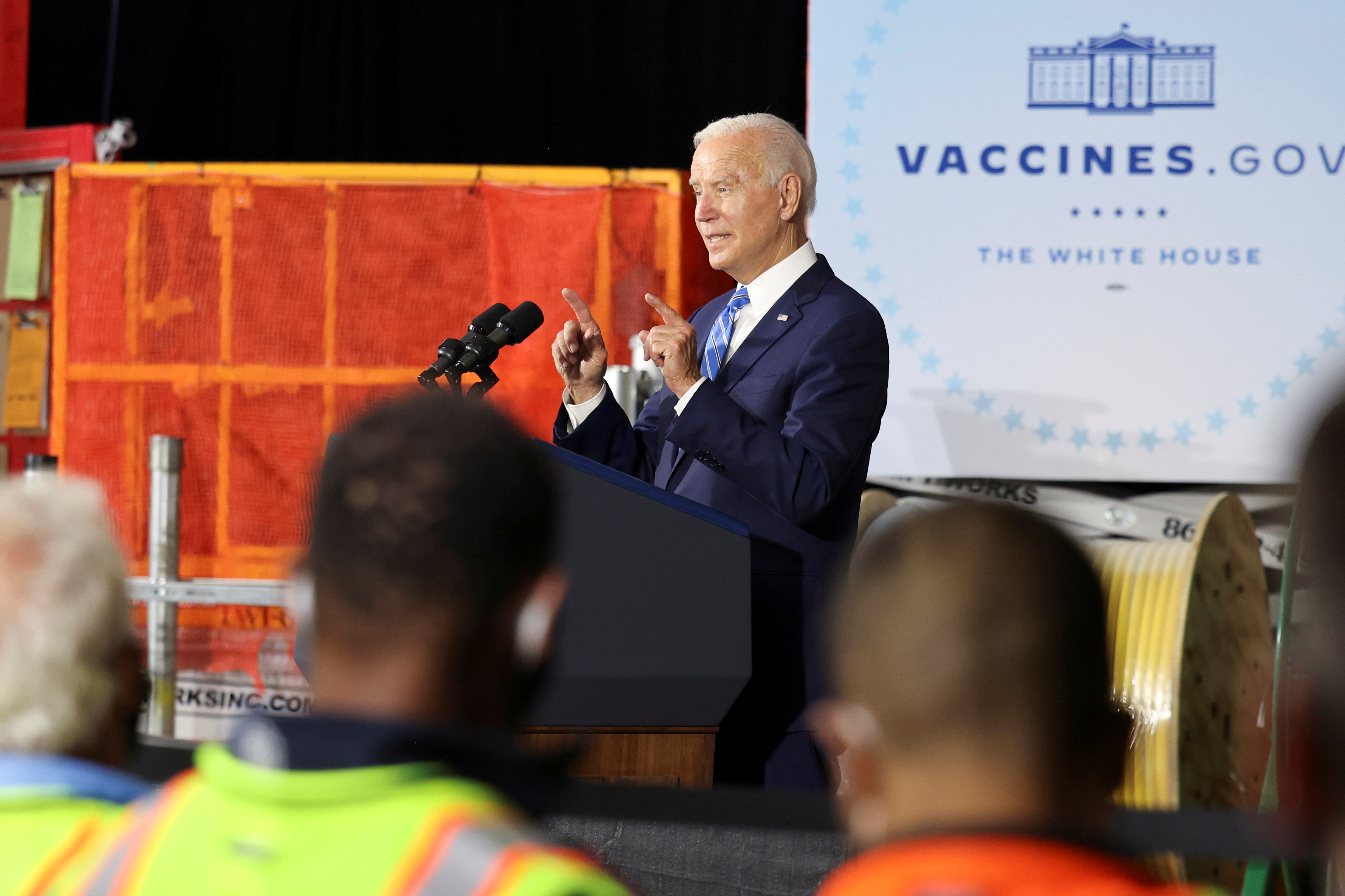 U.S. President Joe Biden gestures as he delivers remarks on the importance of COVID-19 vaccine requirements, during a visit at a Clayco construction site, in Elk Grove Village, Illinois, U.S. October 7, 2021. REUTERS/Evelyn Hockstein