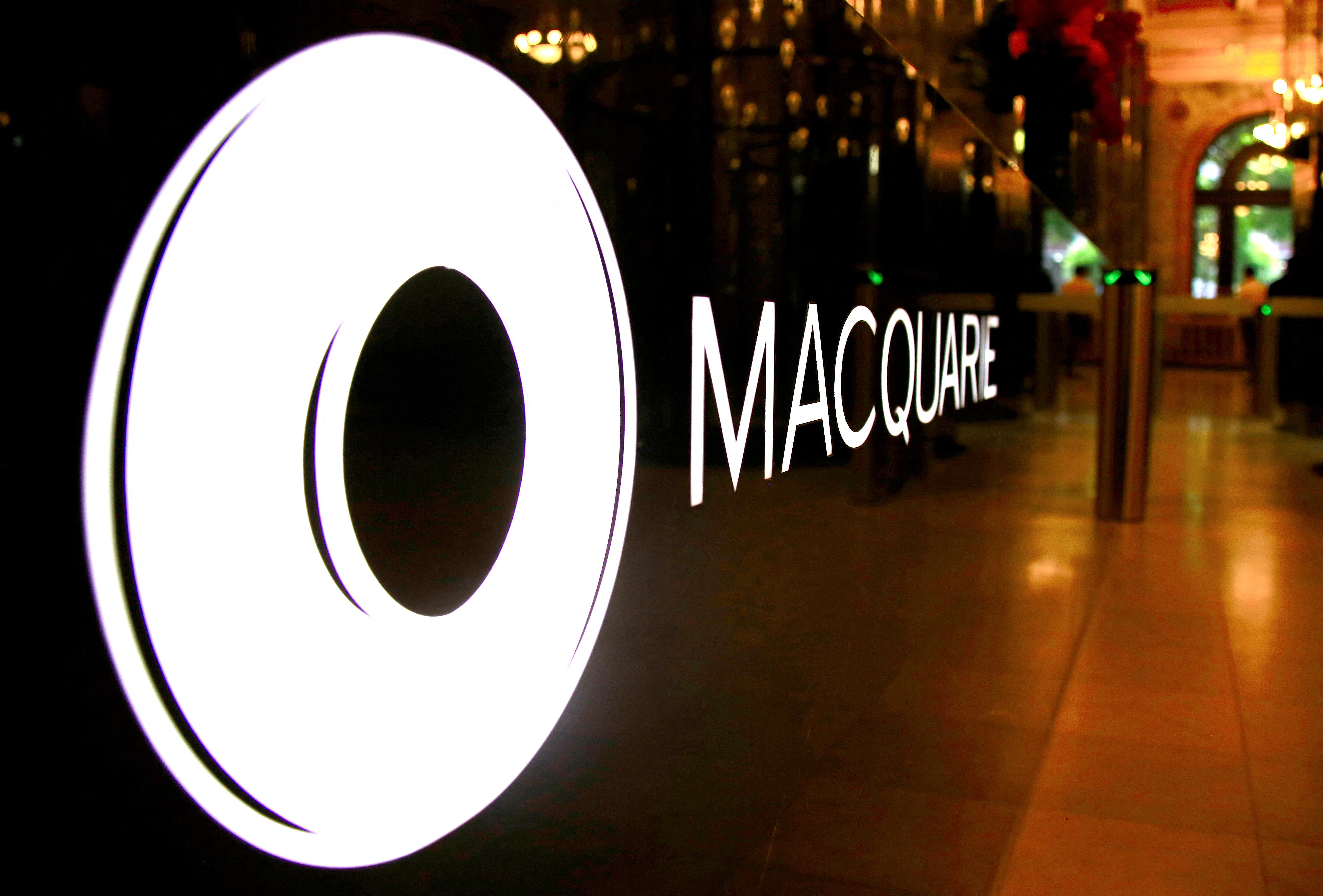 The logo of Australia's Macquarie Group Ltd adorns a desk in the reception area of their Sydney office headquarters