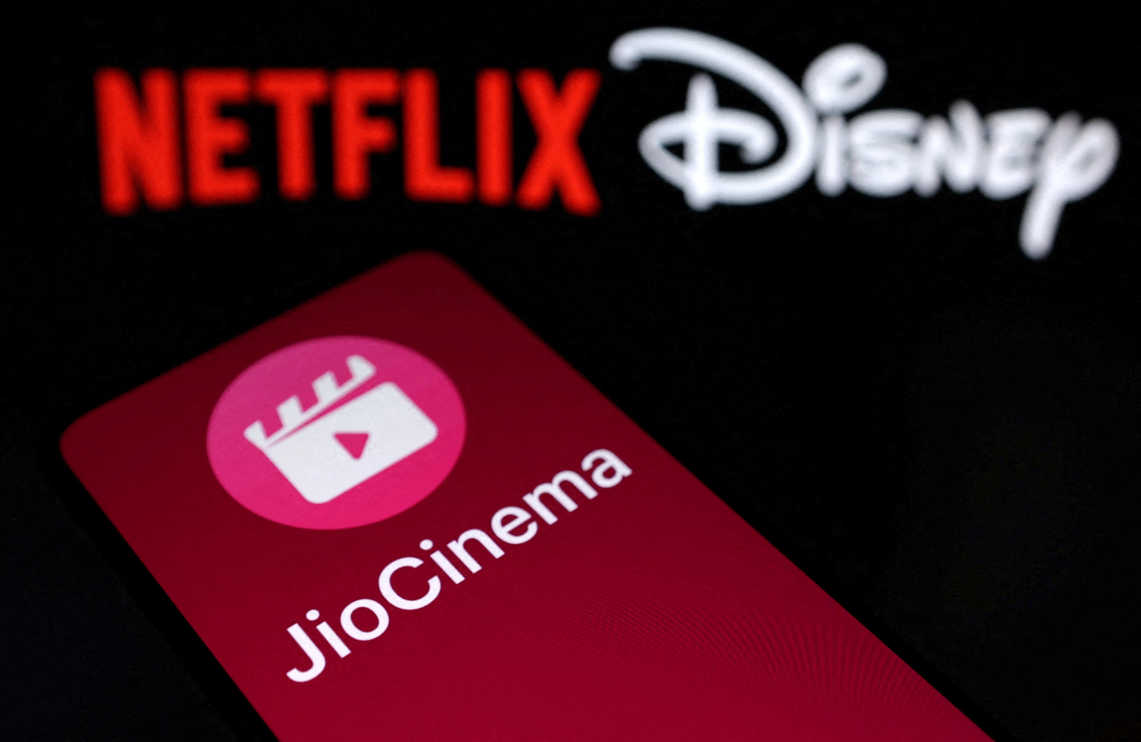 Illustration shows JioCinema, Netflix and Disney logos