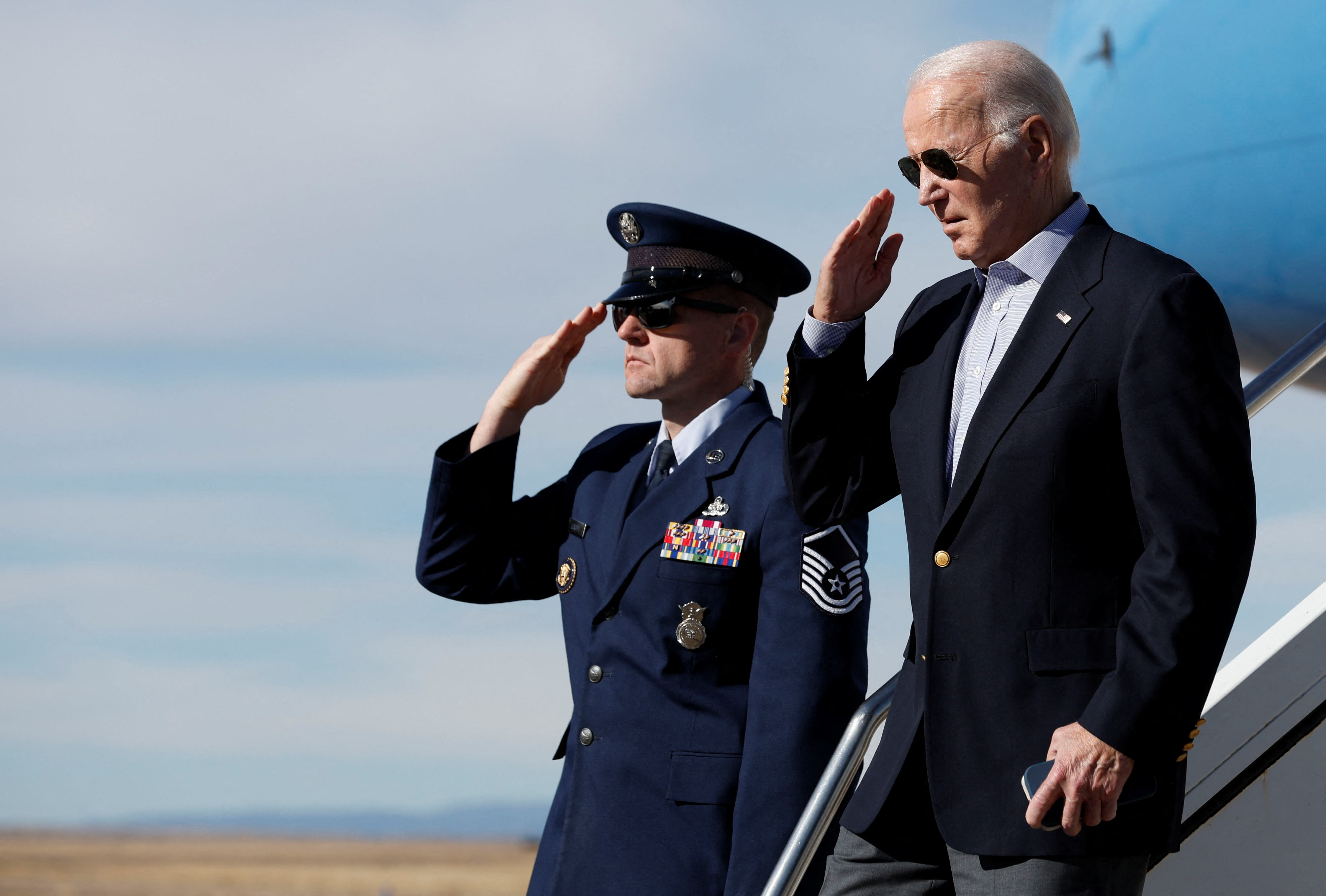 Biden signs 886 billion US defense policy bill into law Reuters