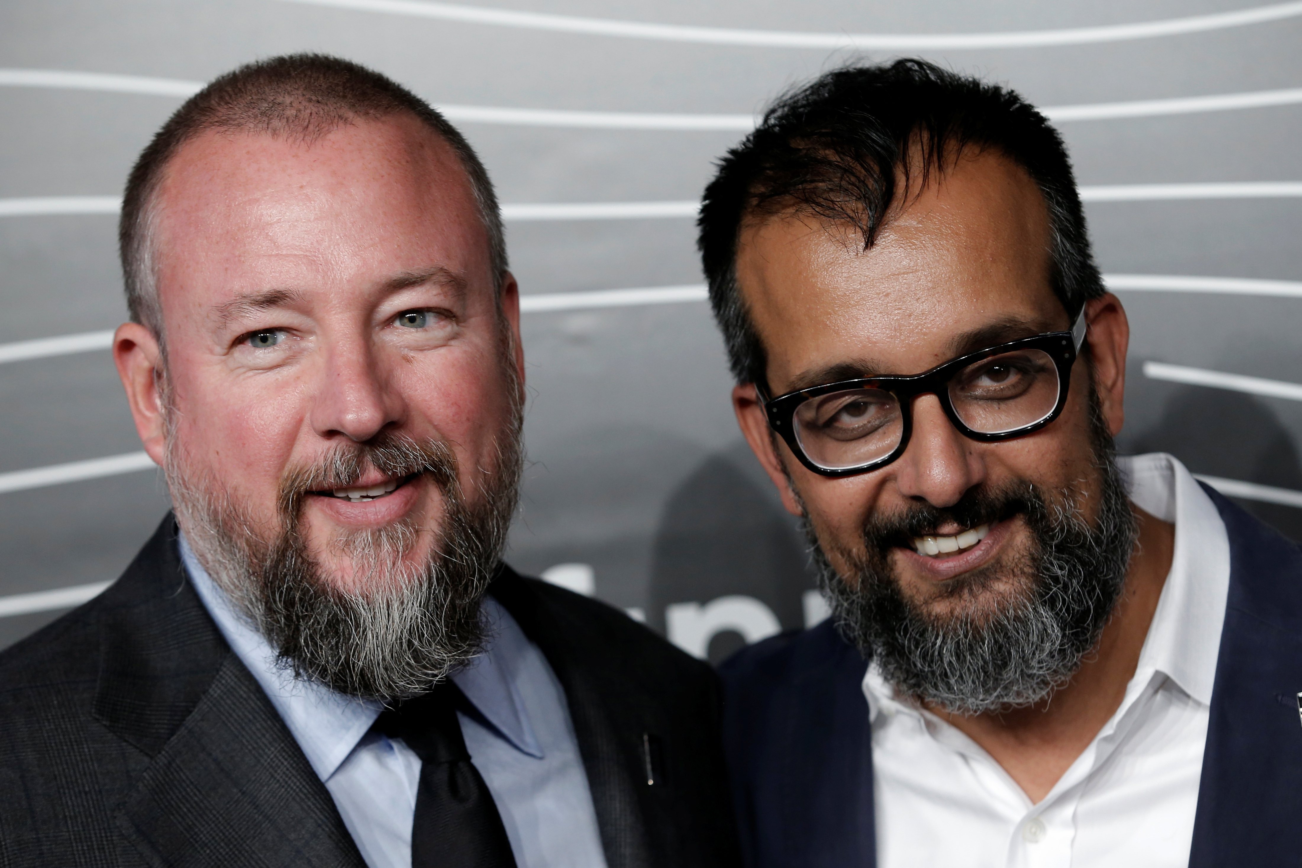 VICE co-founders Shane Smith and Suroosh Alvi pose as they arrive at the 20th Annual Webby Awards in Manhattan, New York