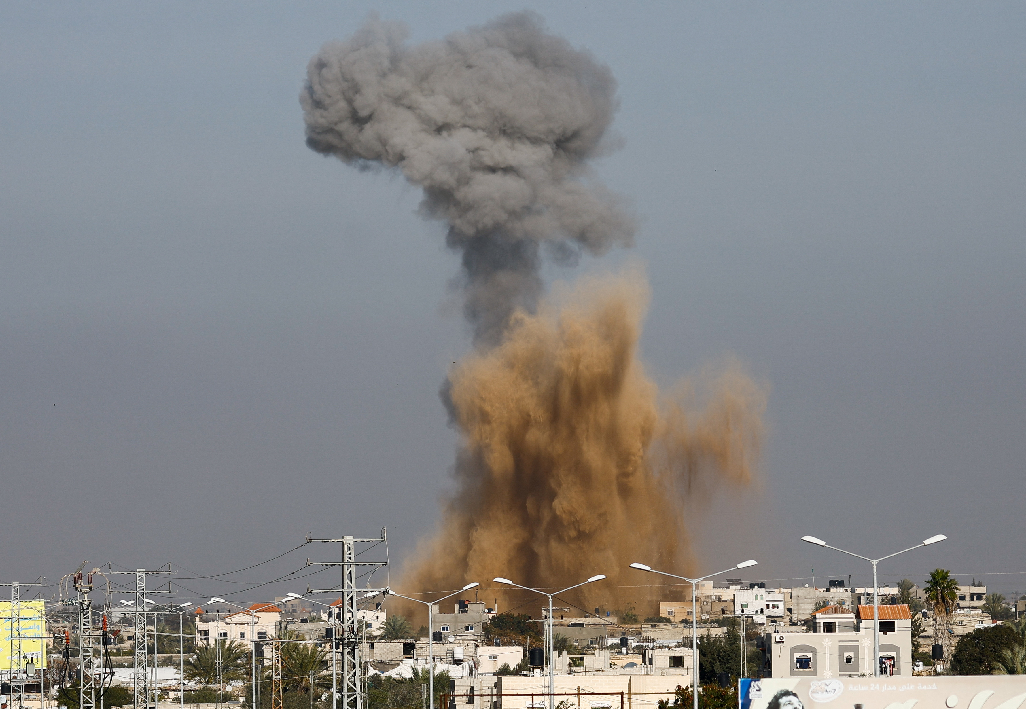 Smoke rises following Israeli strikes, as seen from Rafah
