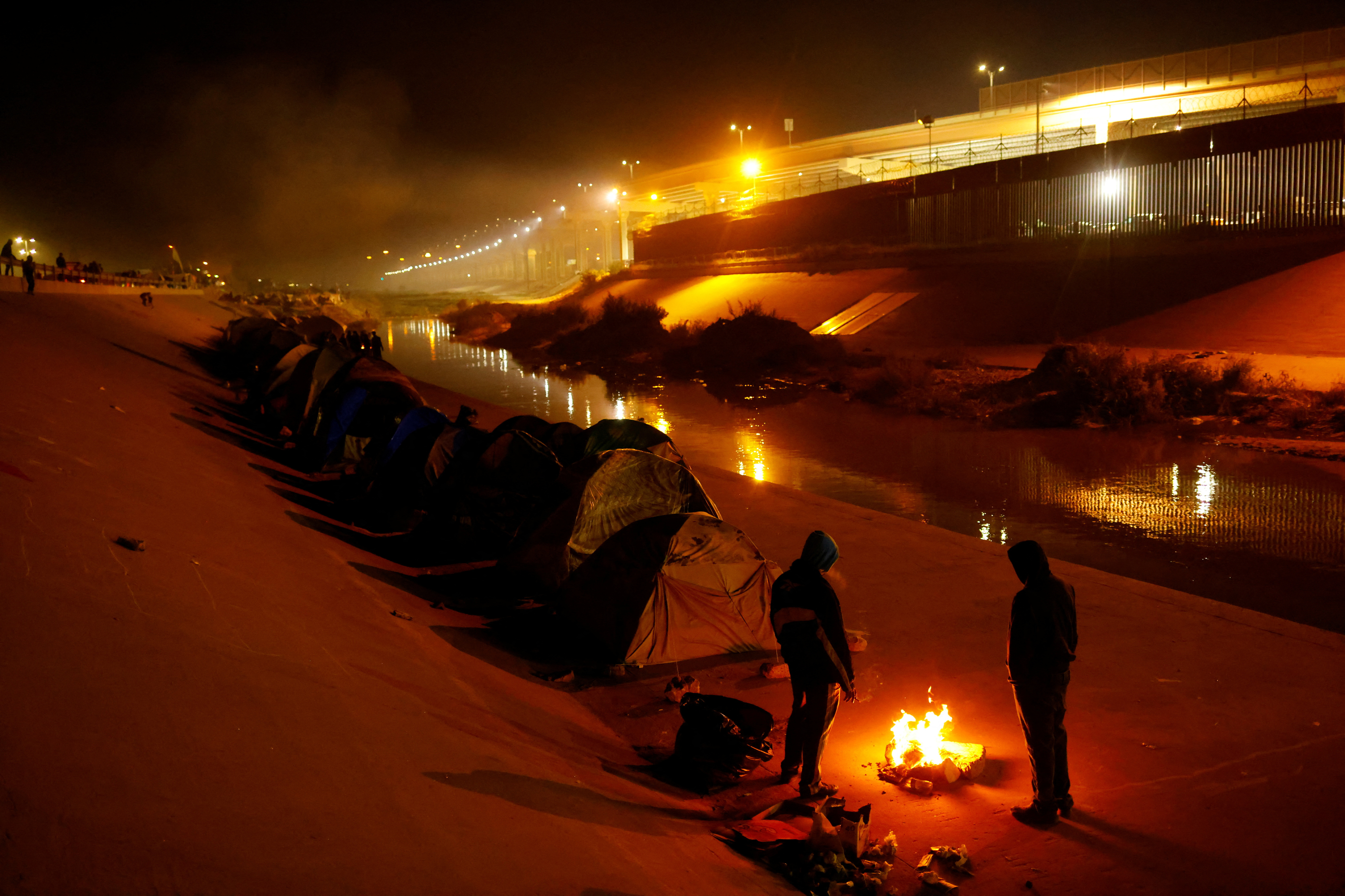 Venezuelan migrants at a camp on the banks of the Rio Bravo river in Ciudad Juarez