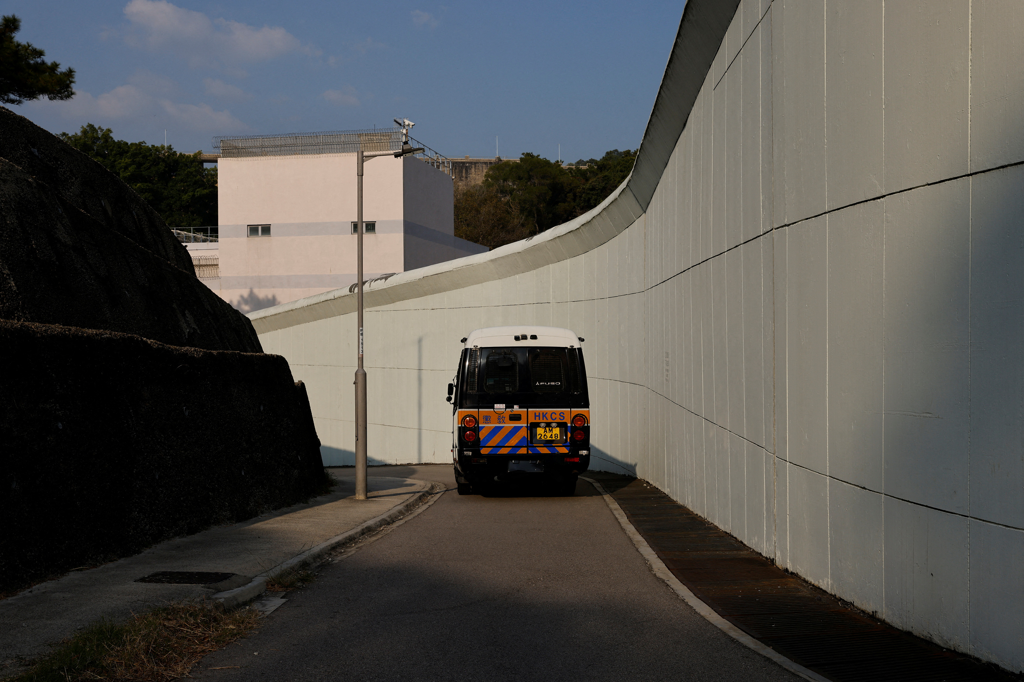 A prisons van is seen drive pass the Tai Lam Centre for Women, in Hong Kong