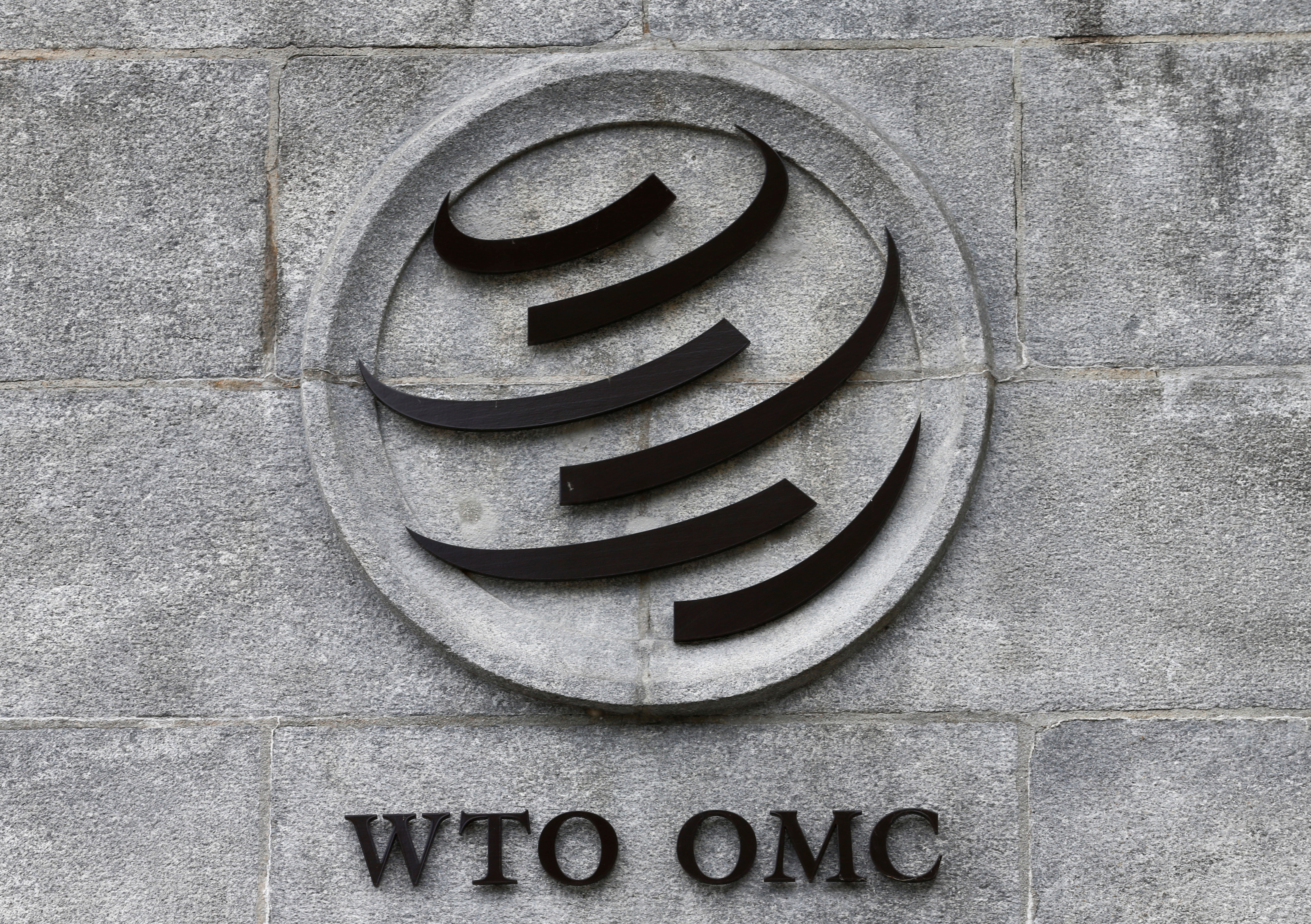 A WTO logo is pictured on their headquarters in Geneva