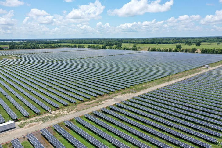 FILE PHOTO: Solar panels are seen in this drone photo at the Impact solar facility in Deport, Texas