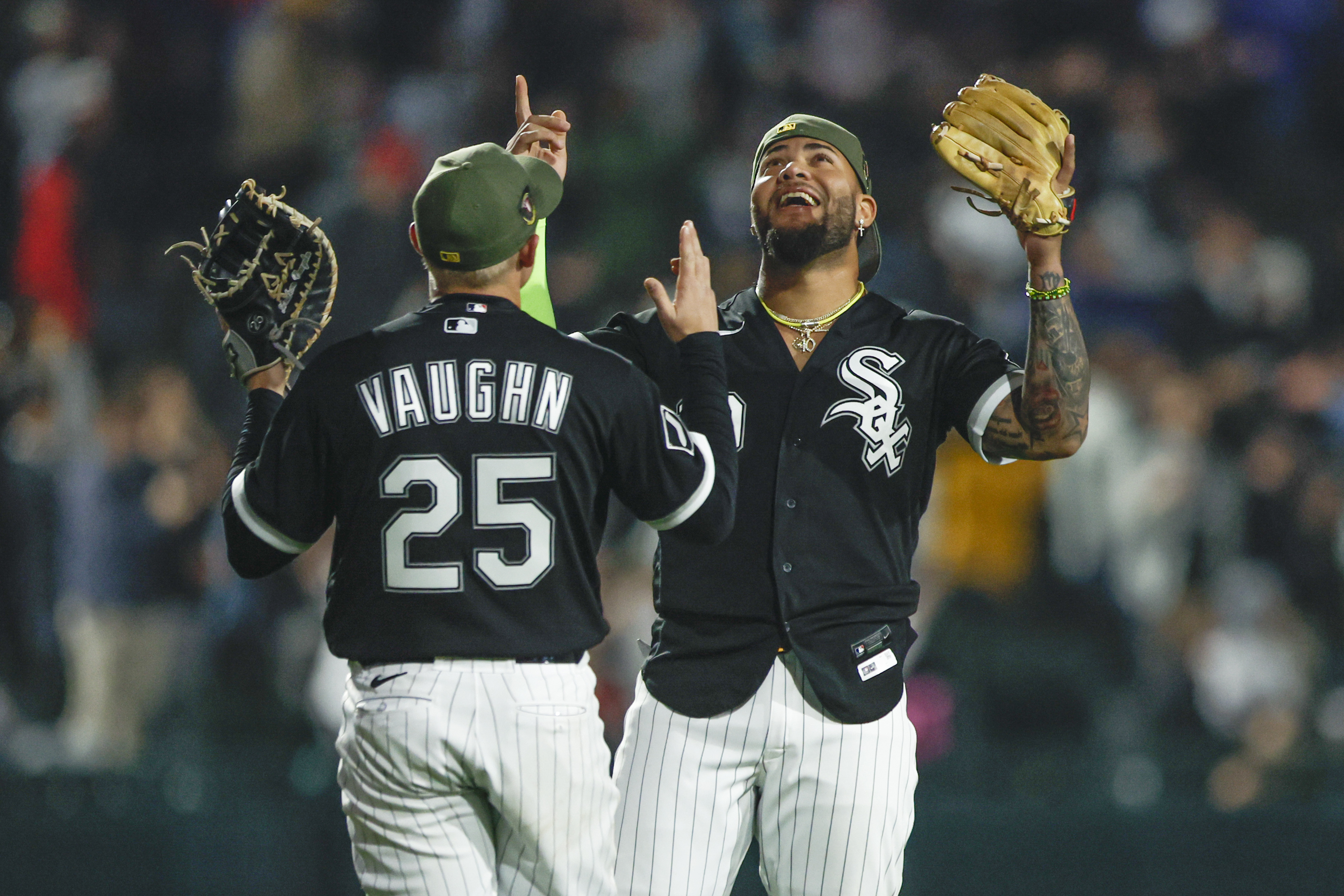 Andrew Vaughn and Yoan Moncada of the Chicago White Sox celebrate