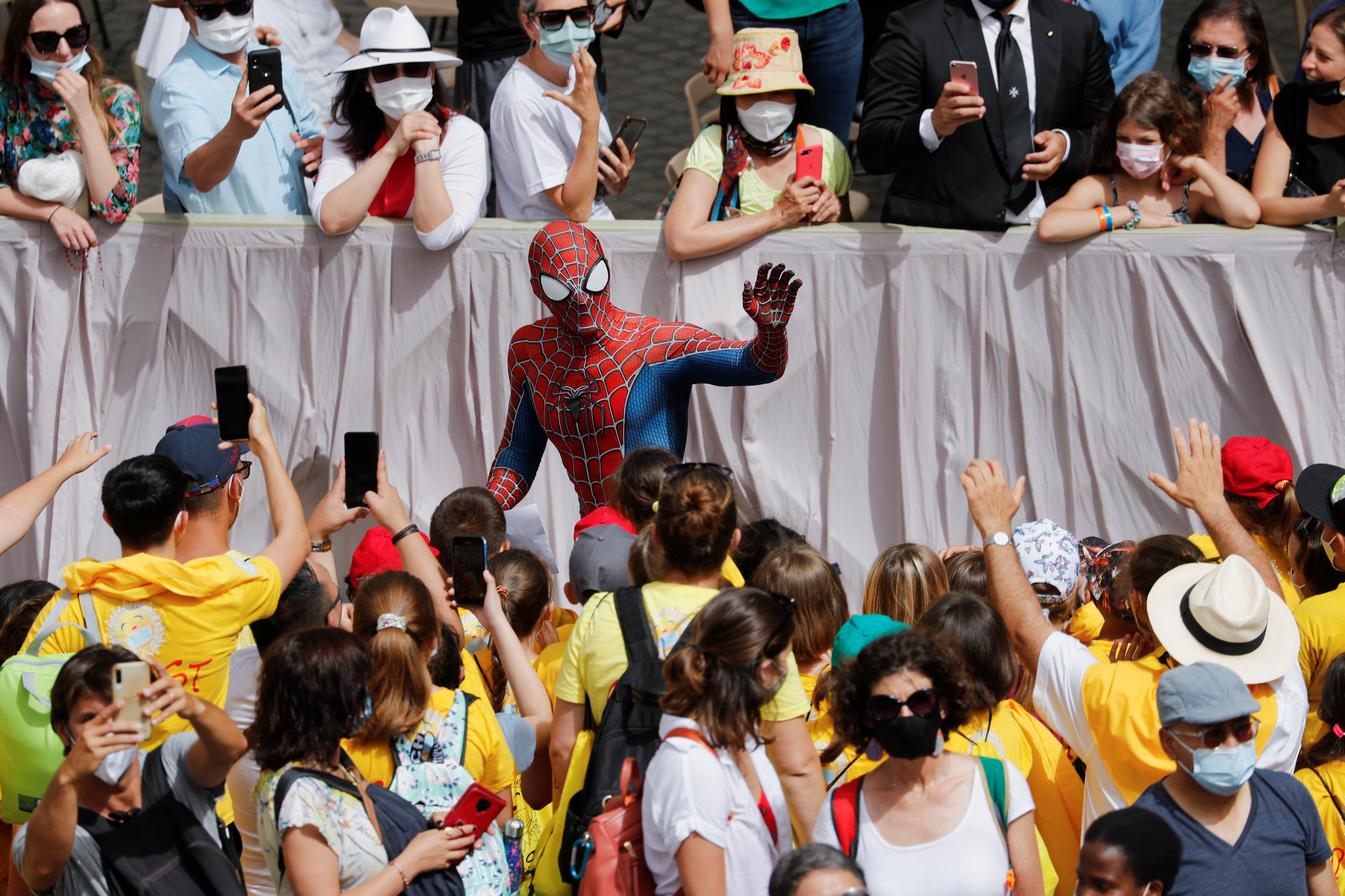 A person dressed as Spiderman leaves after the general audience, amid the coronavirus disease (COVID-19) pandemic, at the Vatican, June 23, 2021. REUTERS/Remo Casilli