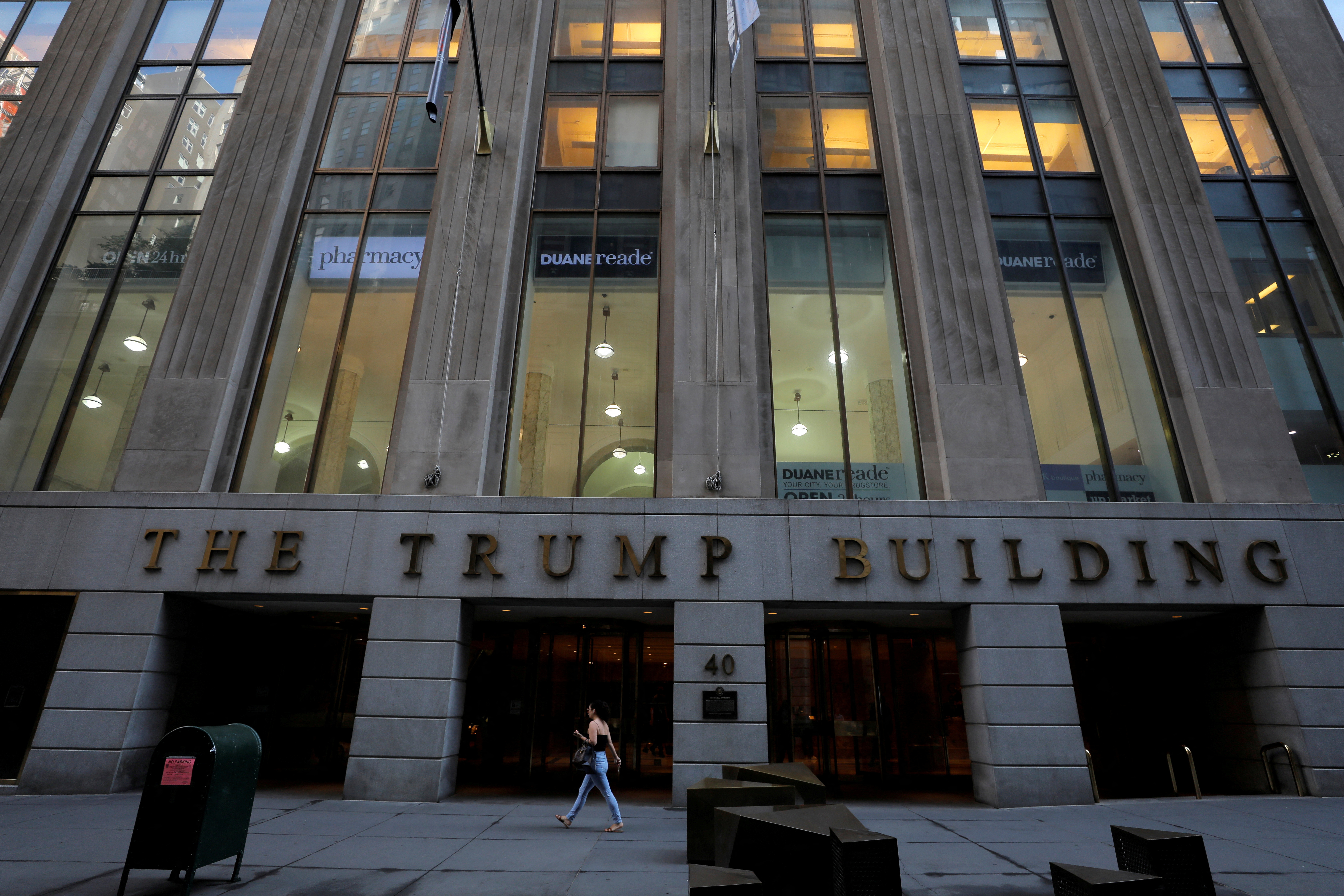 Signage is seen outside of the Trump Building in New York City