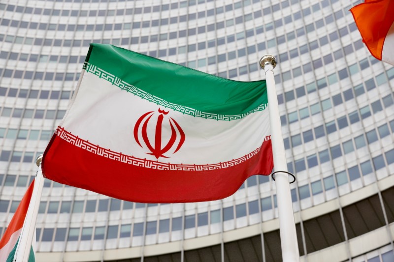 The Iranian flag waves in front of the International Atomic Energy Agency (IAEA) headquarters in Vienna