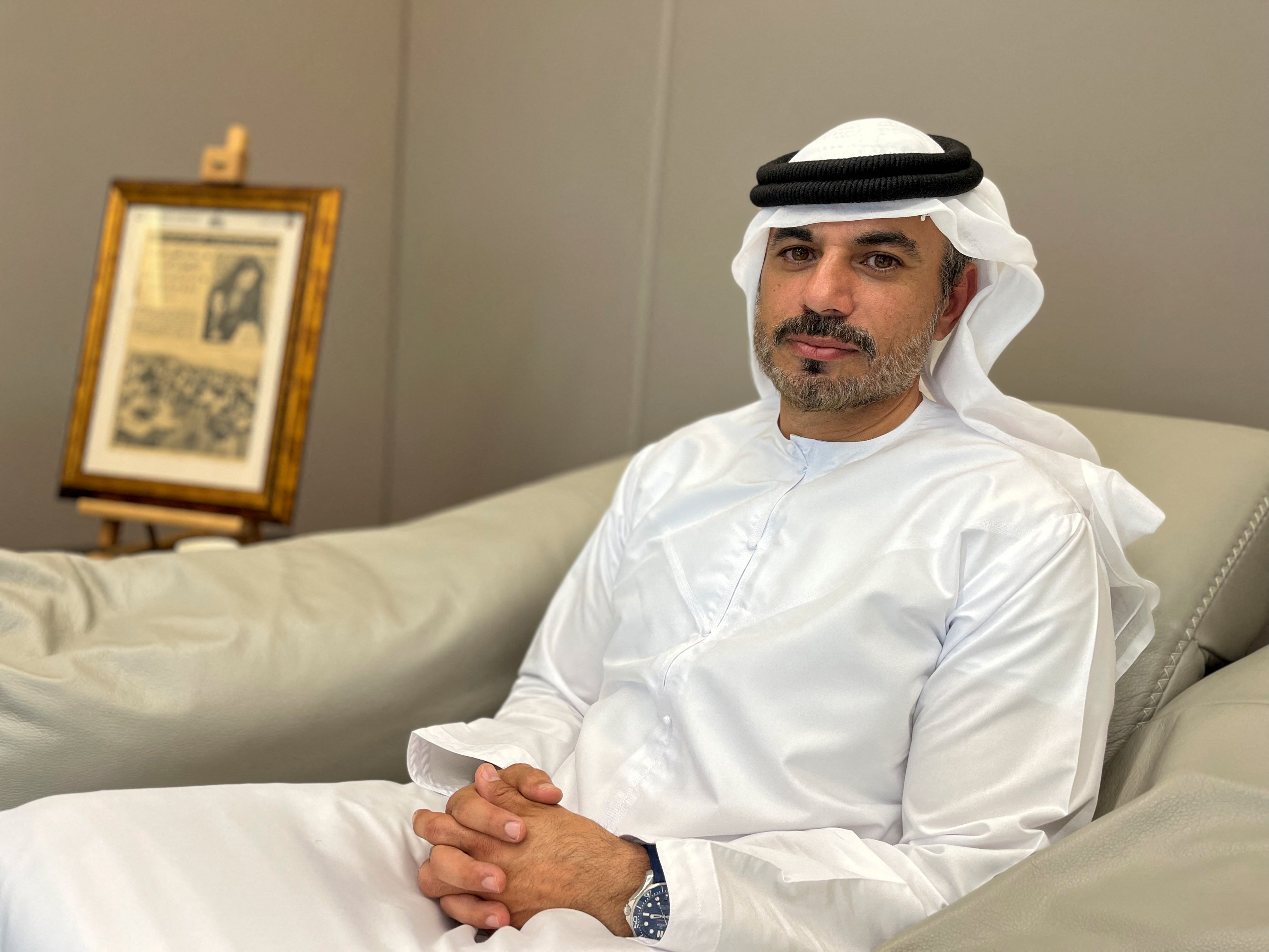 Hisham Khalid Malak, Chairman of the Abu Dhabi Securities Exchange, sits in his office in Abu Dhabi